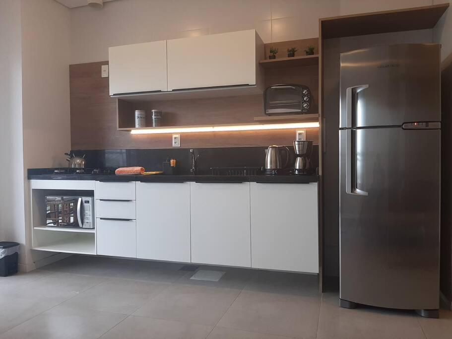 Studio Xavante 615A - com garagem, portaria 24h e uma vista linda!