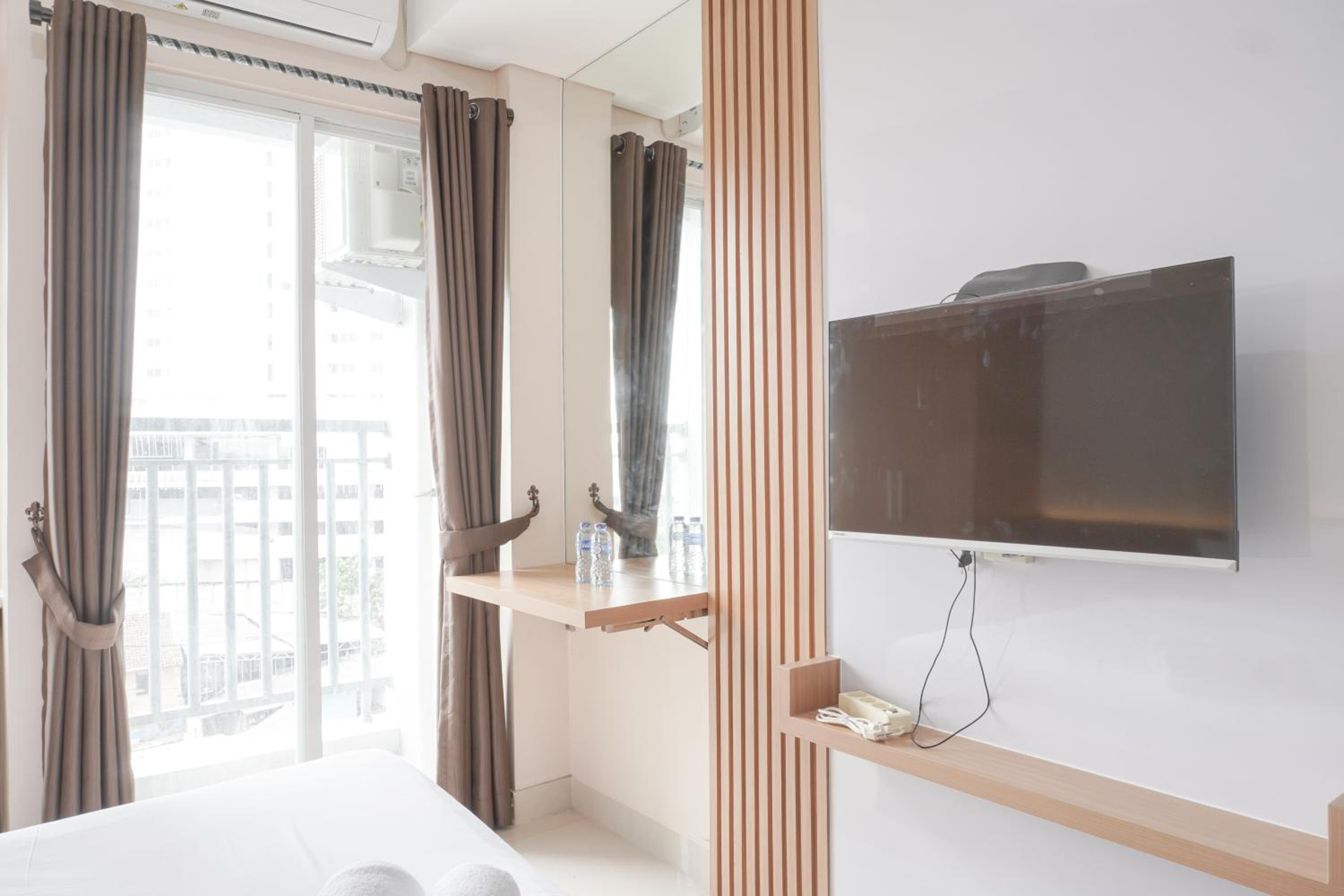Cozy and Simply Studio at Serpong Garden Apartment By Travelio view 5