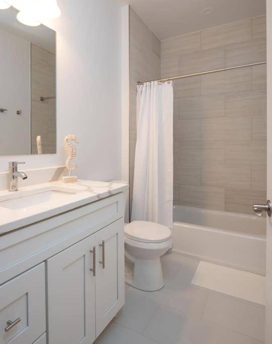 Sea-Renity Now in a 4 Bedroom 4 Bath view 2