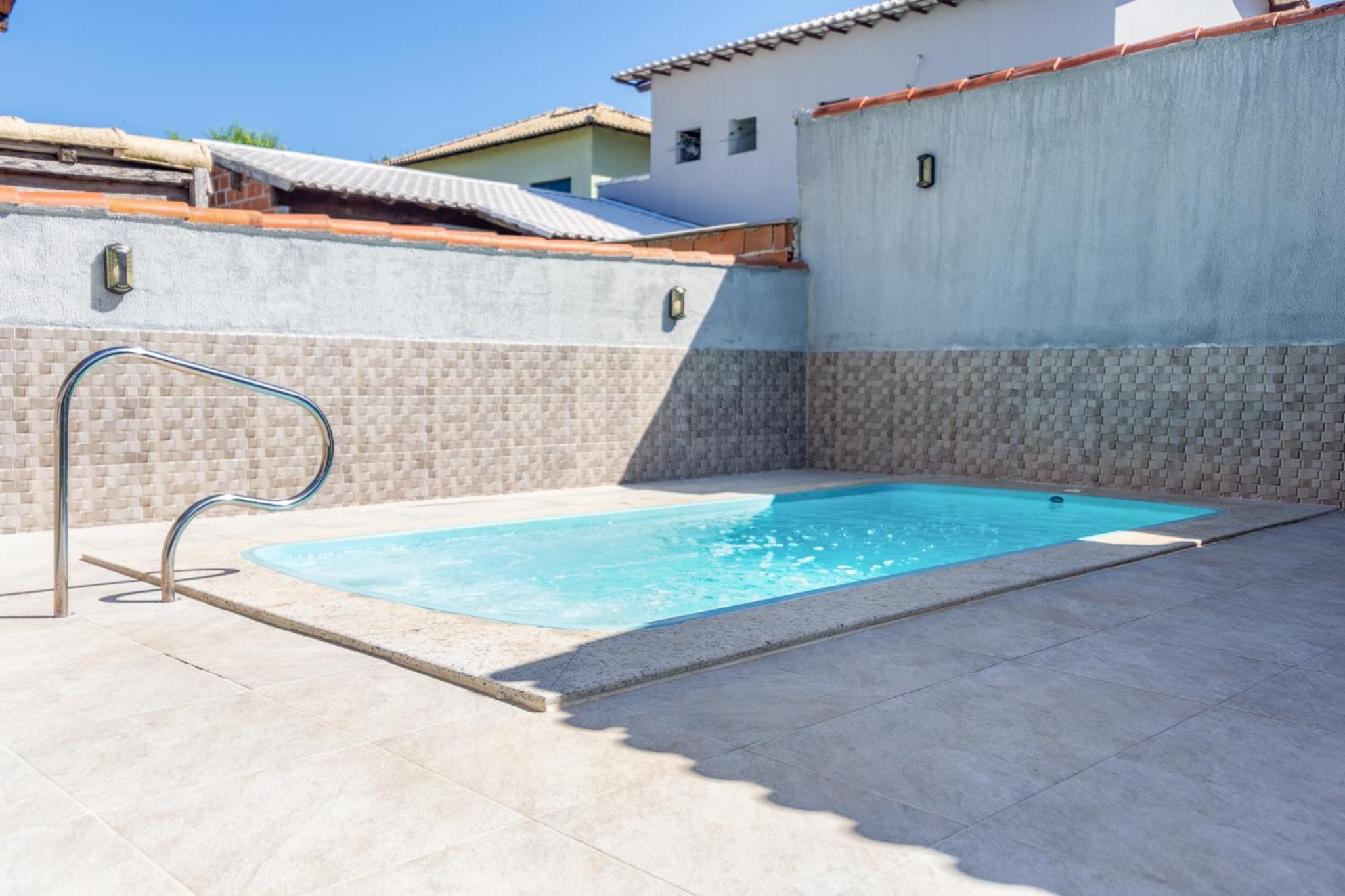 Casa de Praia com Piscina Aquecida e 4 Suítes e garagem 3 carros, 800 mtrs da praia internet 700 mbps, condomínio privado com pista de skate , quadra de fu
