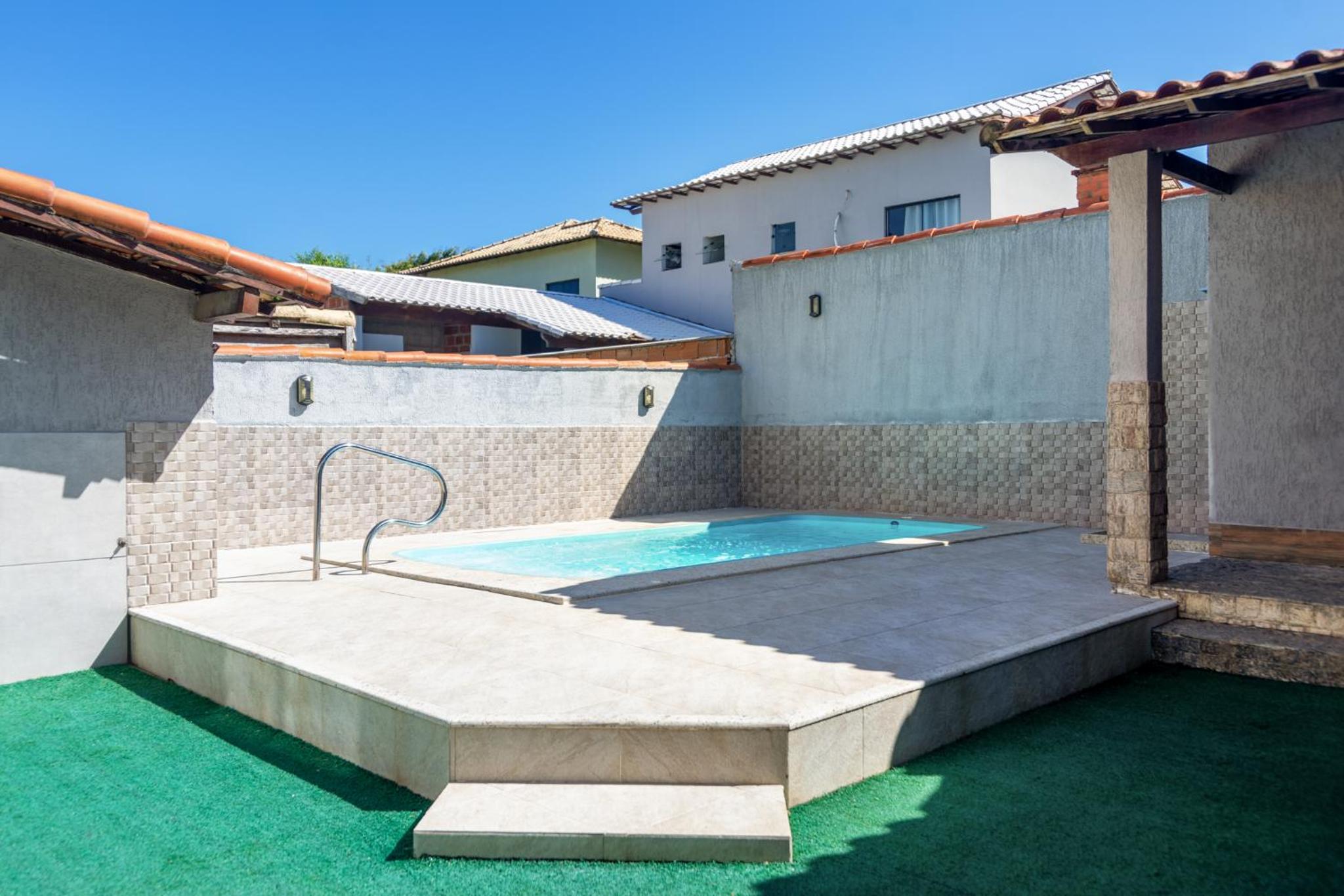 Casa de Praia com Piscina Aquecida e 4 Suítes e garagem 3 carros, 800 mtrs da praia internet 700 mbps, condomínio privado com pista de skate , quadra de fu