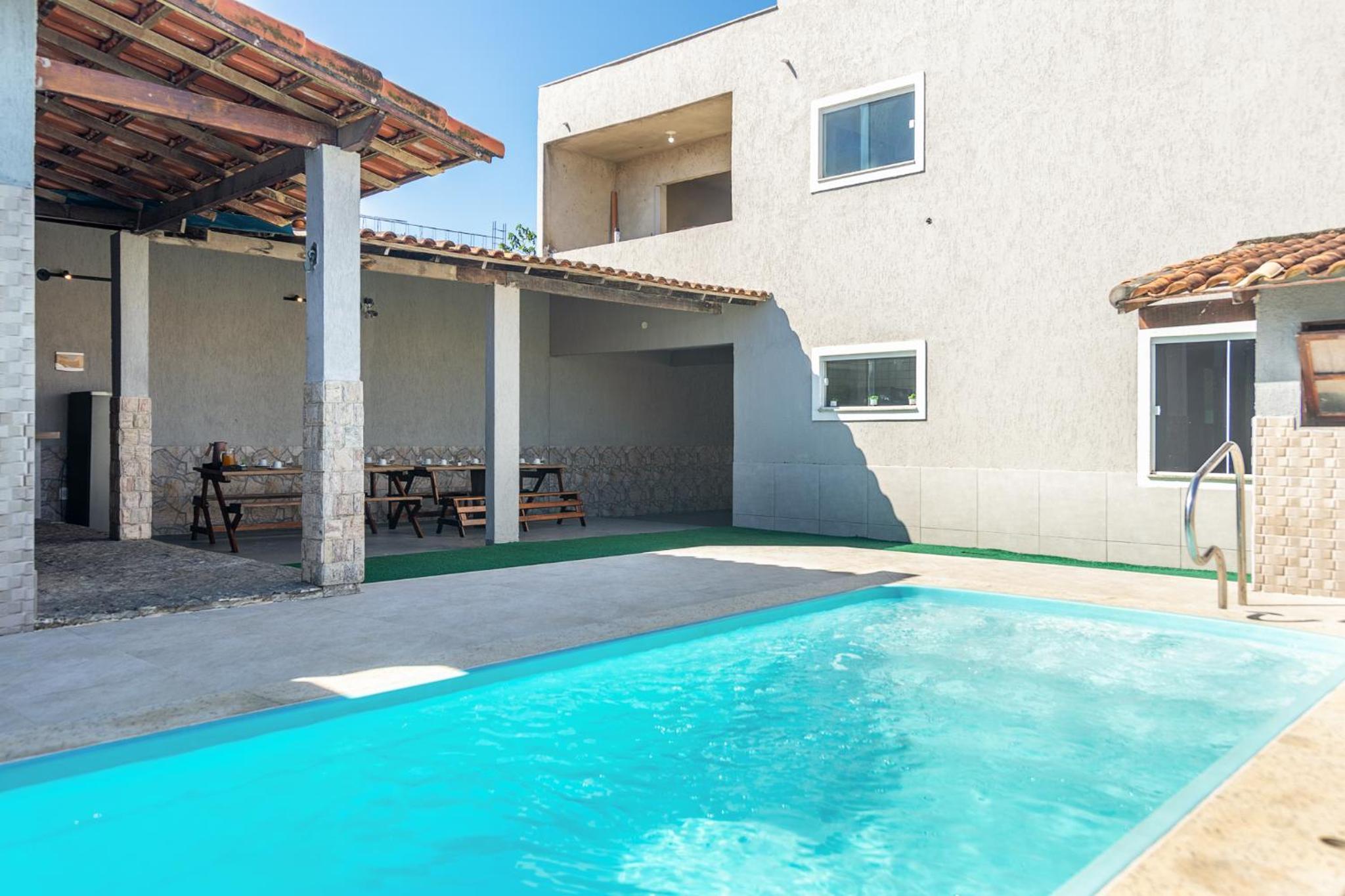 Casa de Praia com Piscina Aquecida e 4 Suítes e garagem 3 carros, 800 mtrs da praia internet 700 mbps, condomínio privado com pista de skate , quadra de fu