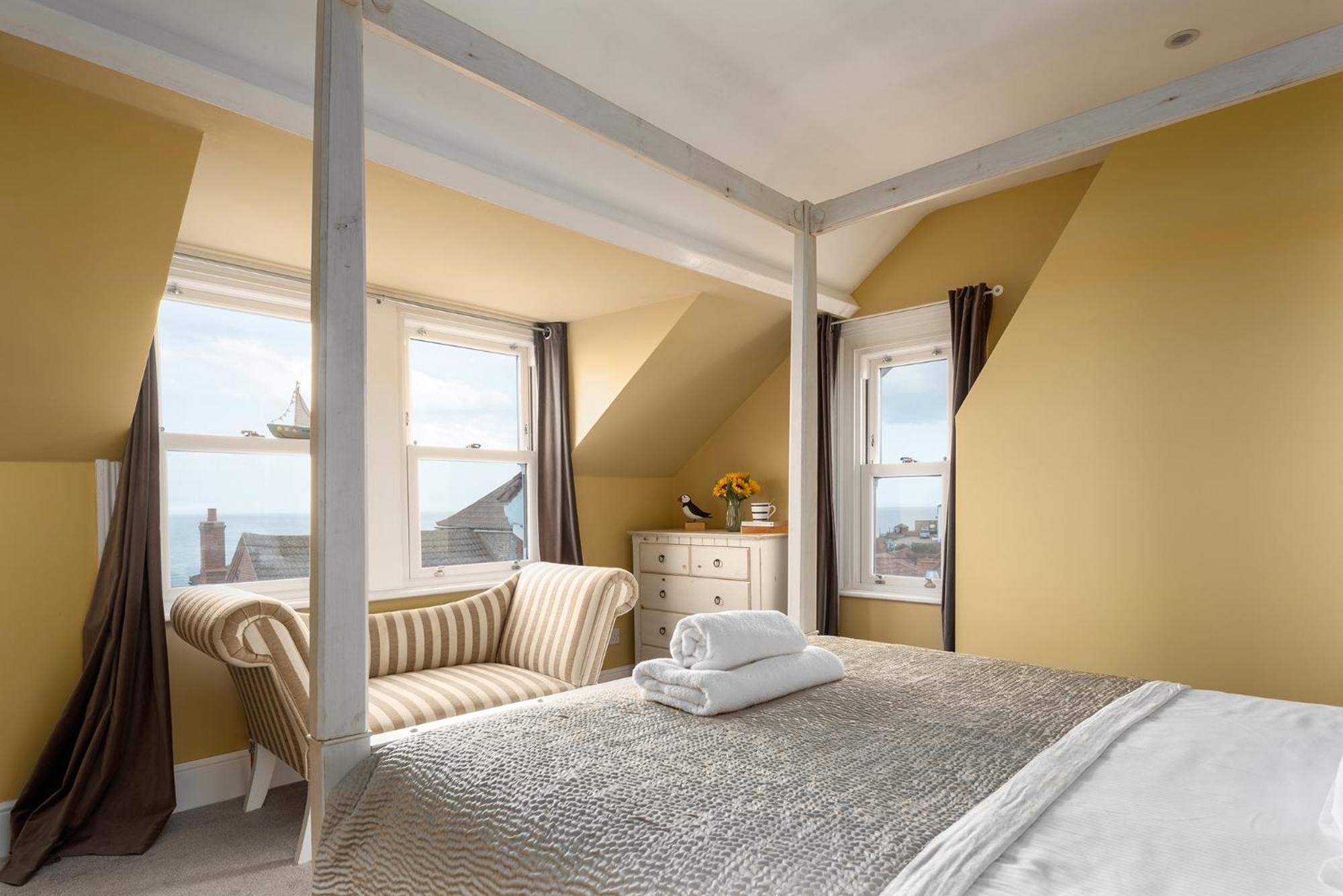Opposite the beach, hot tub & sauna, sleeps 16