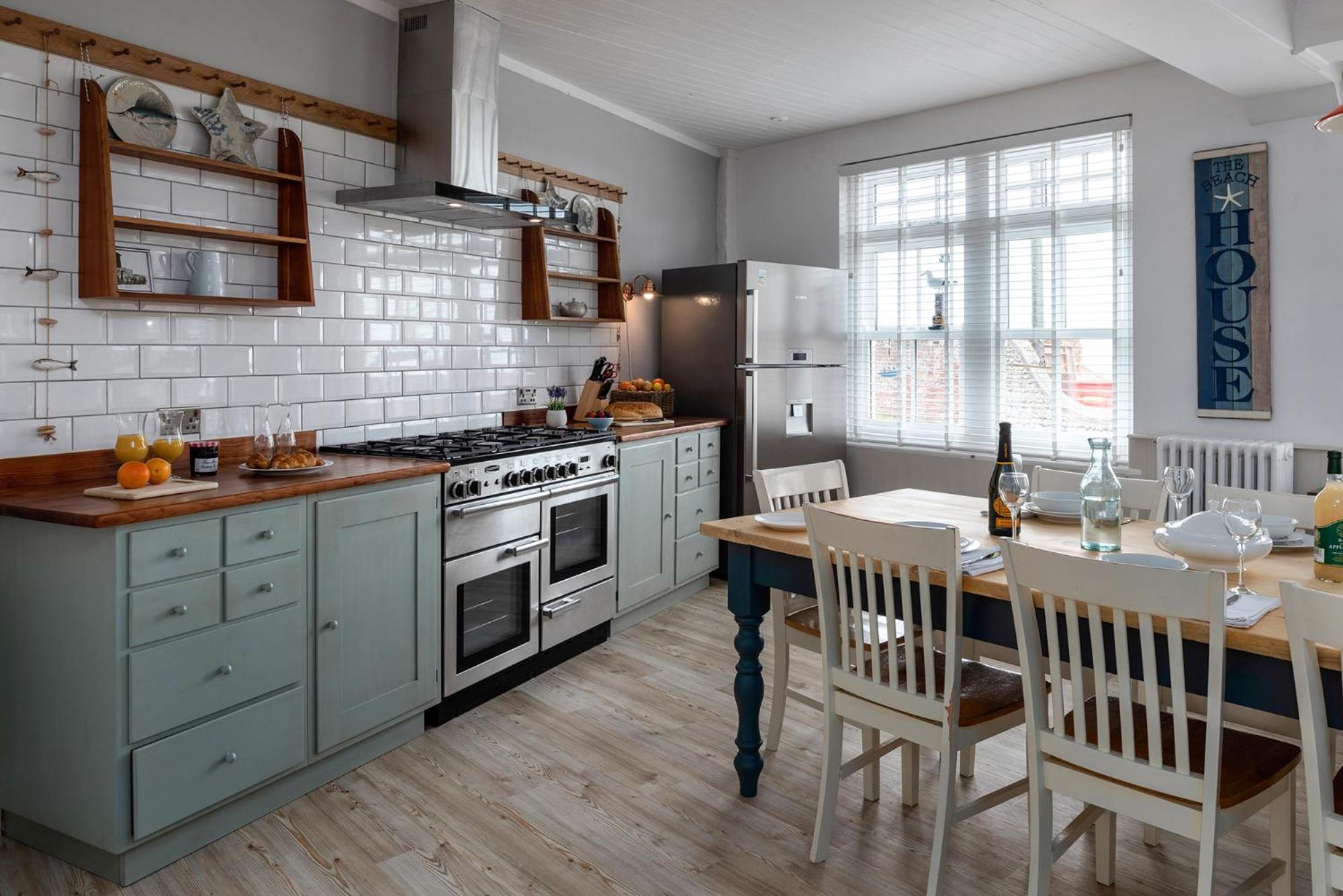 Opposite the beach, hot tub & sauna, sleeps 16