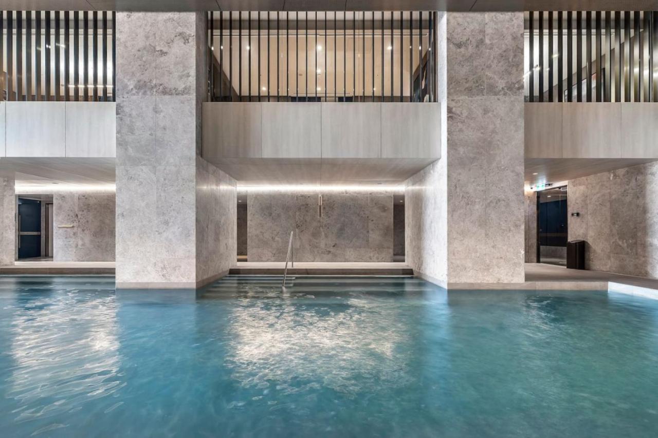 Sleek Stylish CBD, Heated pool, Gym, Sauna, Steam