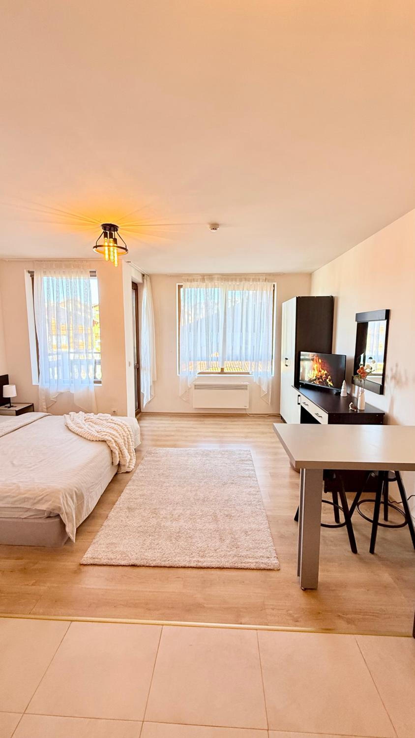 Bansko Vacations - Encanto Bansko Cozy Studio with Balcony and Stunning Mountain Town Views in SPA Resort - Property Image 1