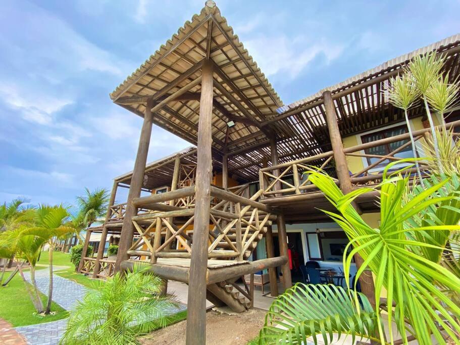 107 - Village aconchegante na praia de Itacimirim