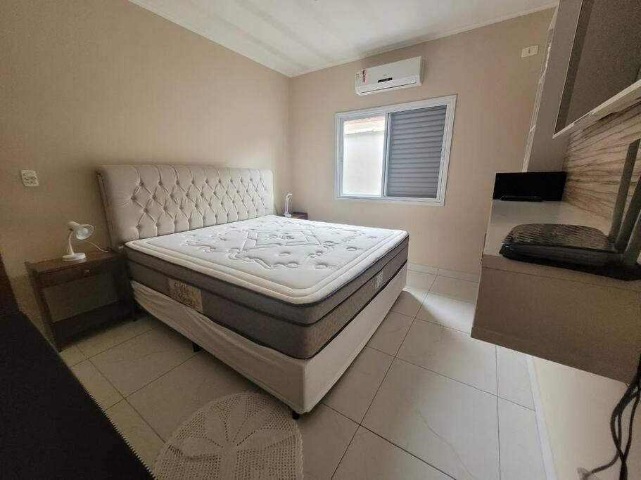 Ótima Casa com Piscina e área goumert em Ubatuba - Condomínio