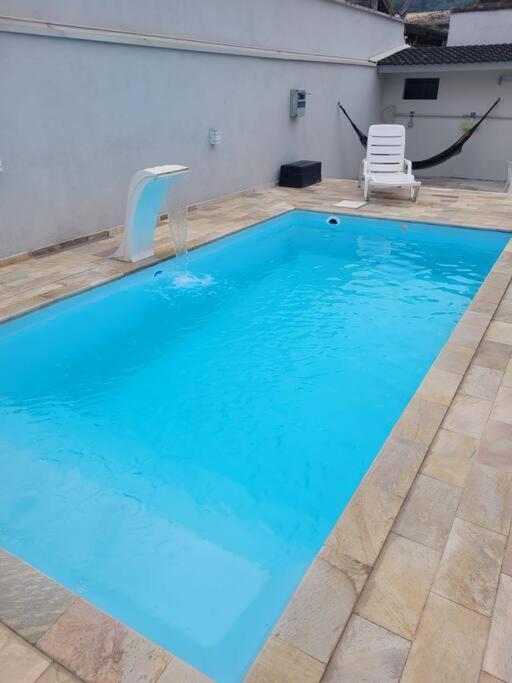 Ótima Casa com Piscina e área goumert em Ubatuba - Condomínio