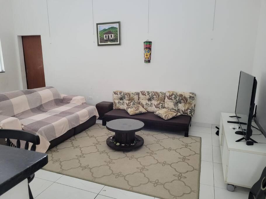 Ótima Casa com Piscina e área goumert em Ubatuba - Condomínio