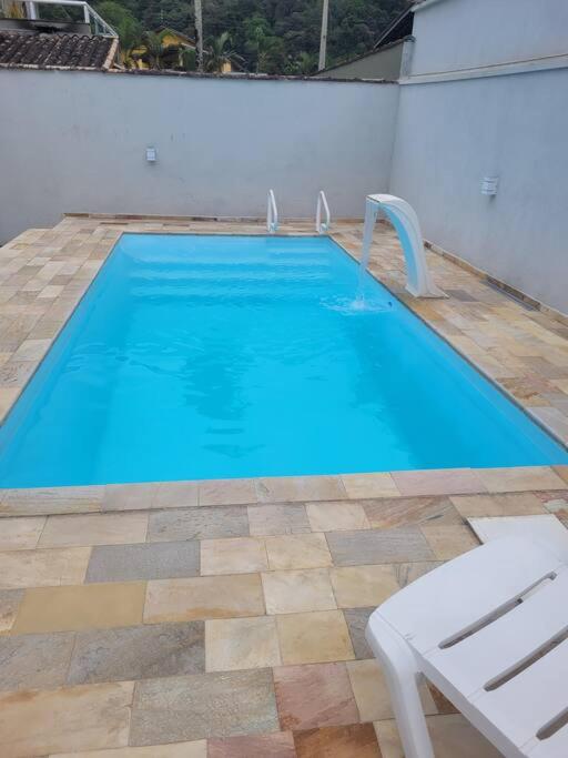 Ótima Casa com Piscina e área goumert em Ubatuba - Condomínio