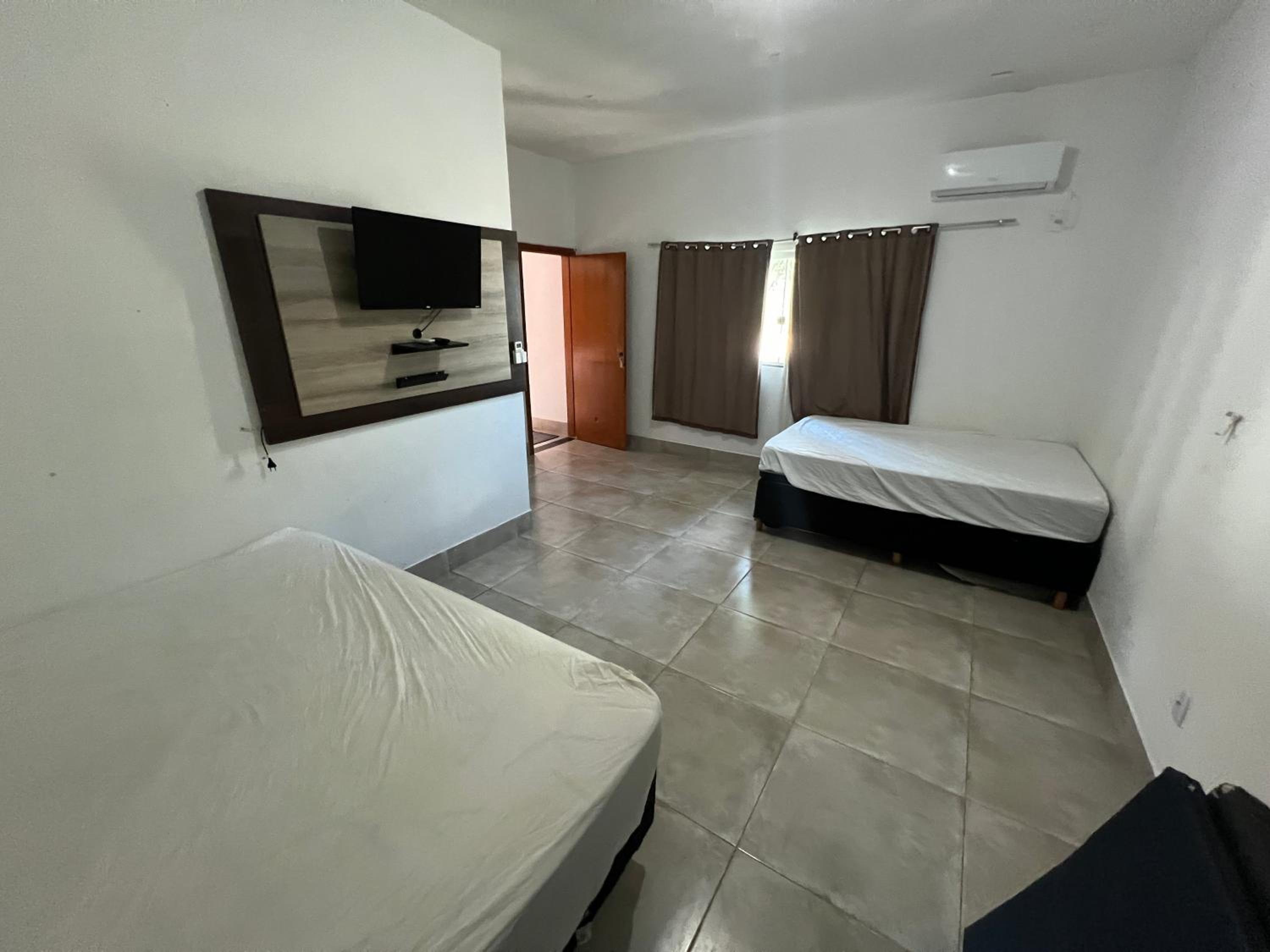 A Casa Paradisíaca lll Com Sinuca e Ar Condicionado em Todos Ambientes com Roupa de Cama e Lavanderia e Ofurô Super Quente com a Vista a Serra de Caldas No
