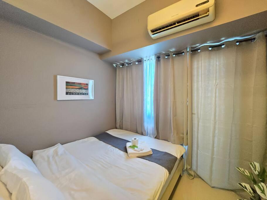 1BR Condotel with Balcony at SM Light Residences #LT10 view 2