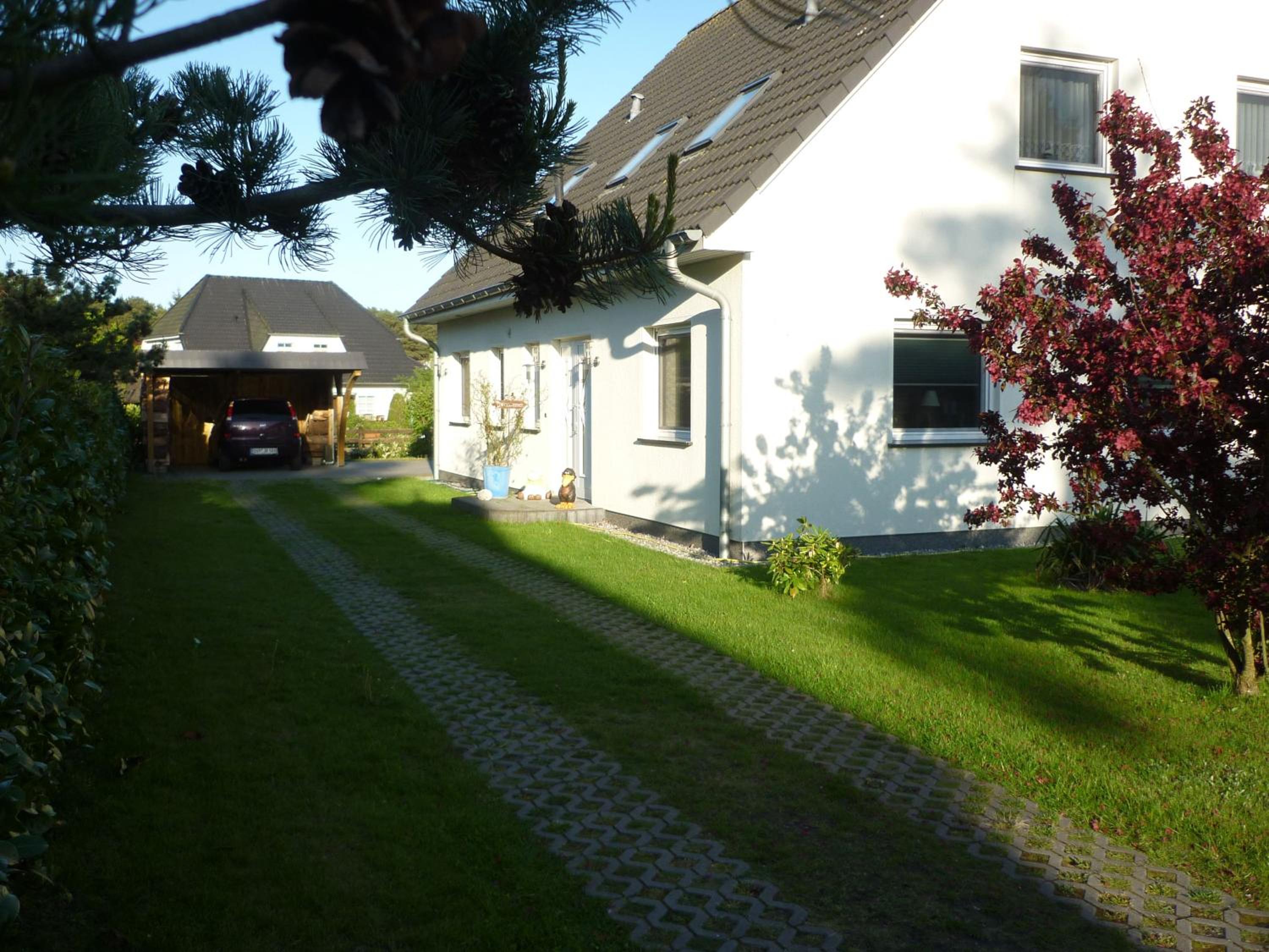Ferienwohnungen in Trassenheide, WLAN, Sitzecke mit Grill