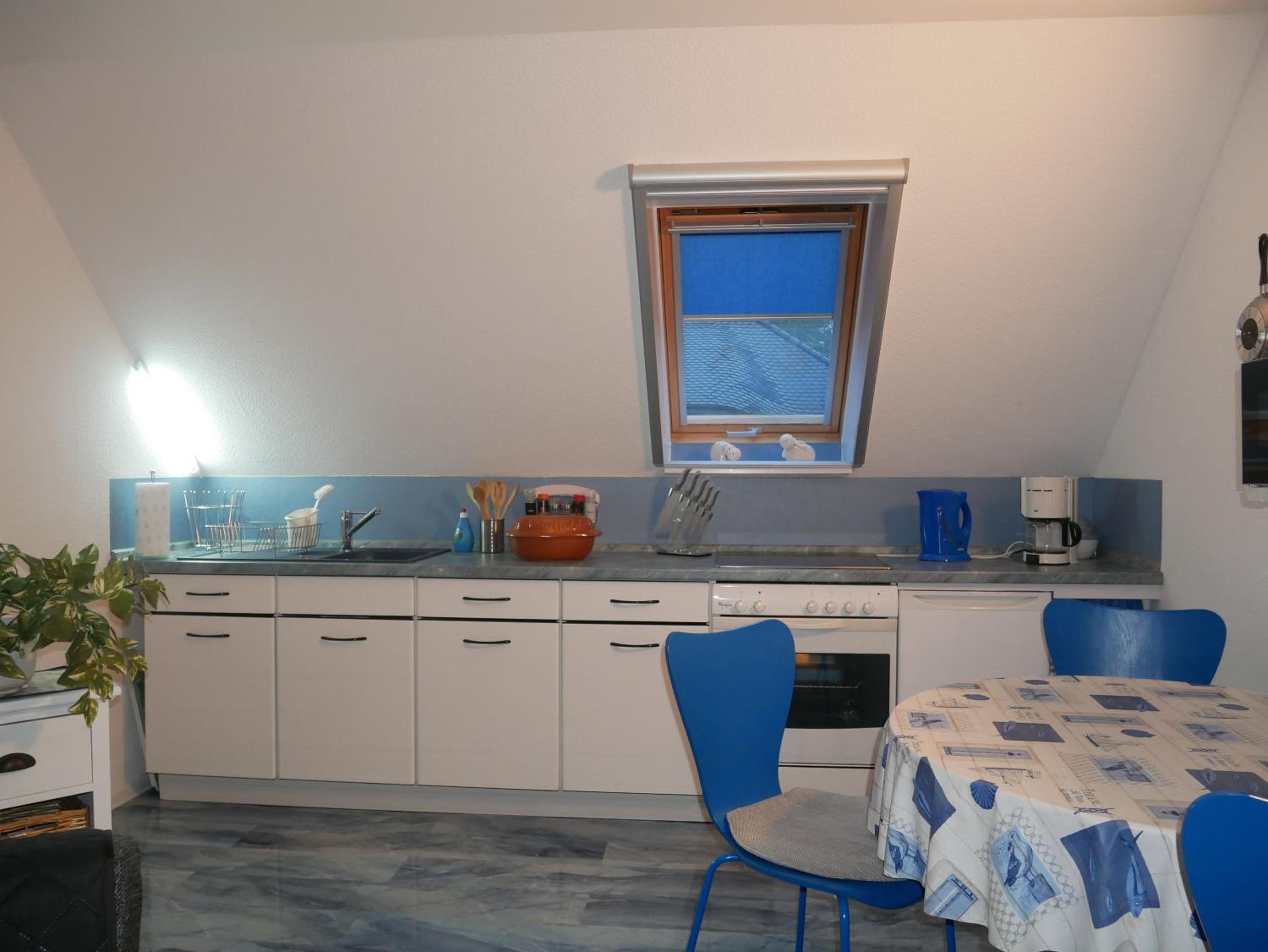 Ferienwohnungen in Trassenheide, WLAN, Sitzecke mit Grill