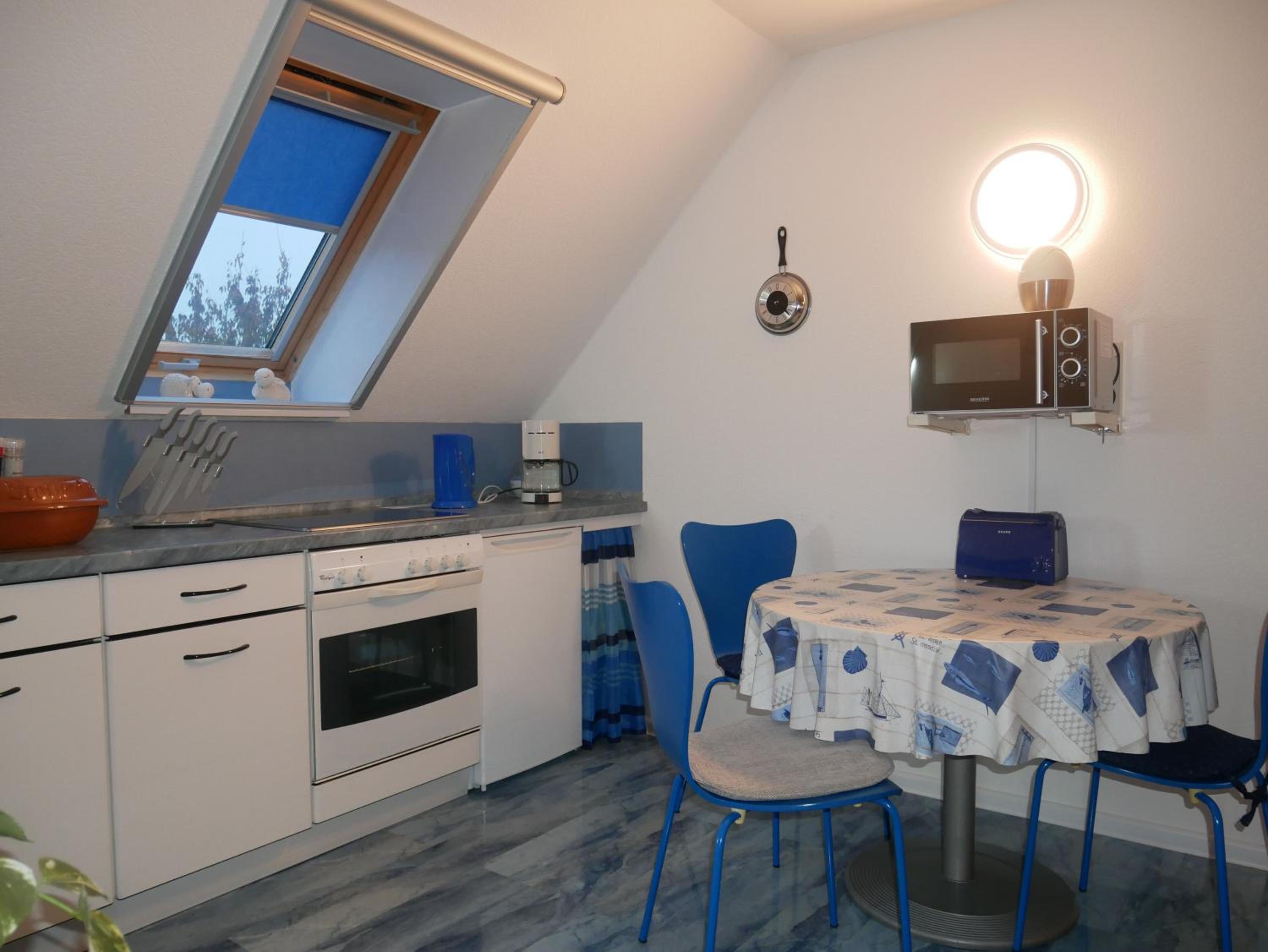 Ferienwohnungen in Trassenheide, WLAN, Sitzecke mit Grill