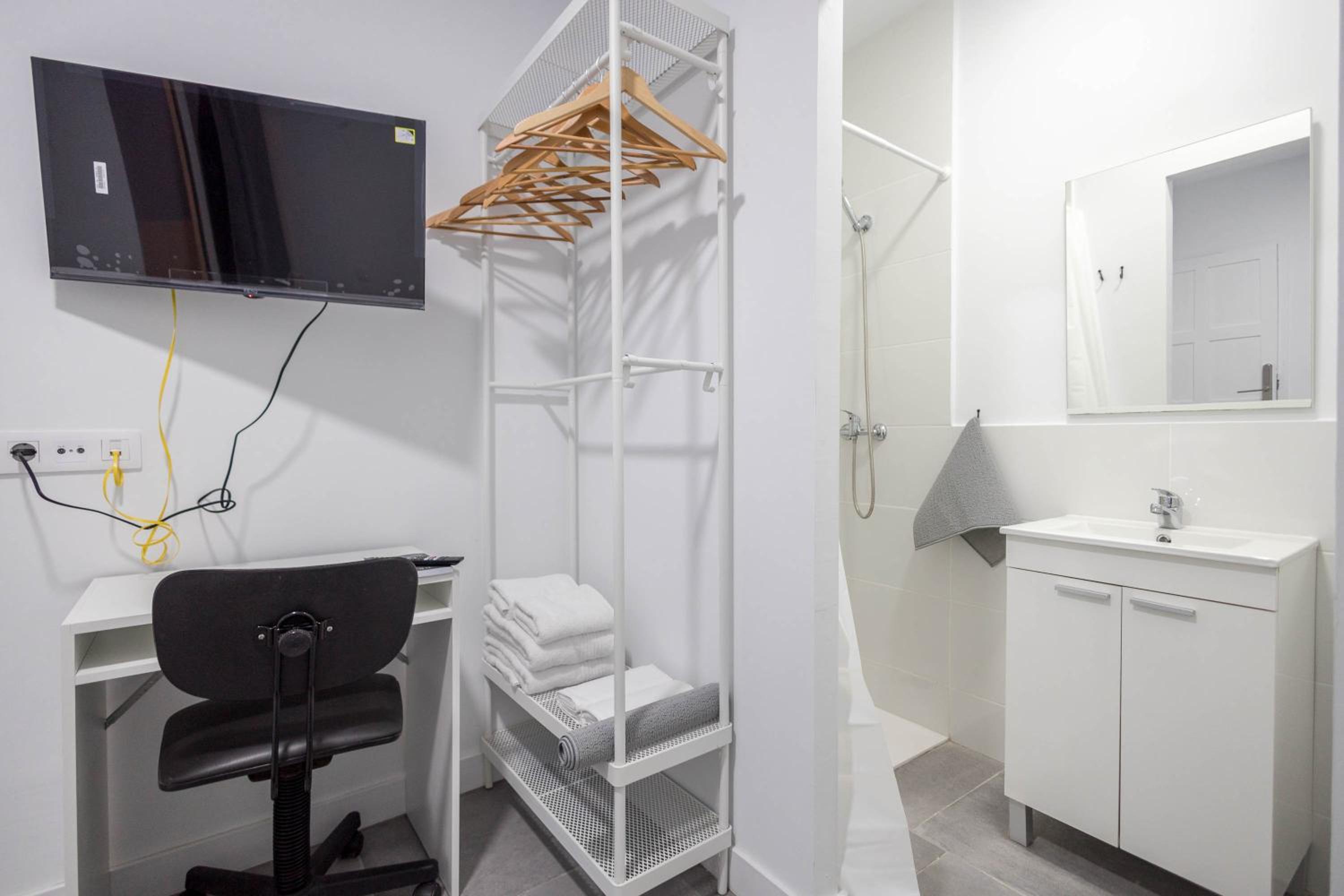 Mol-Terrace, En-Suite Bathroom, Fridge & TV view 2