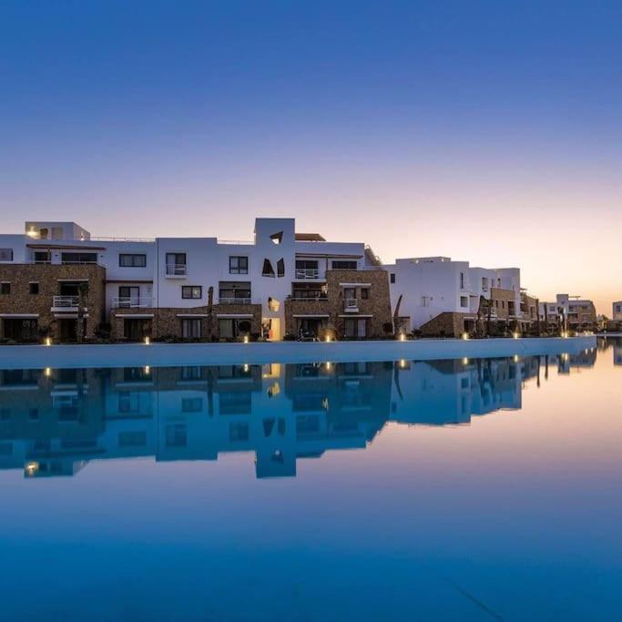 Modern chalet at el gouna Swan Lake compound with Swimable lagoon view