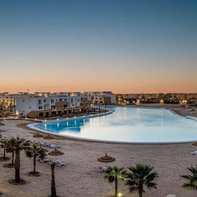 Modern chalet at el gouna Swan Lake compound with Swimable lagoon view