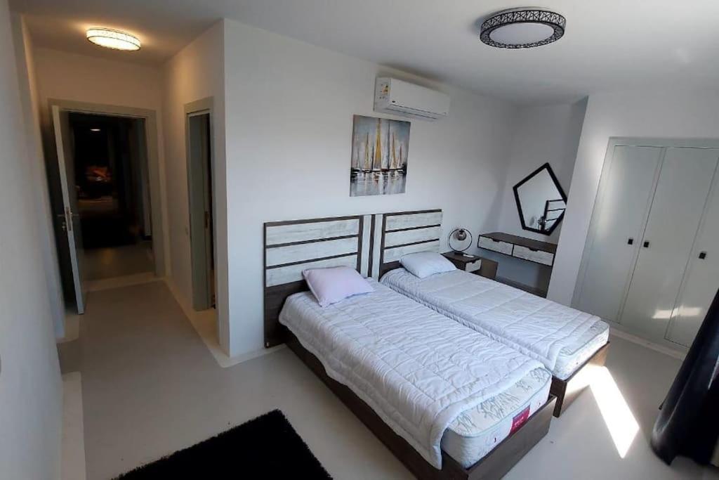 Modern chalet at el gouna Swan Lake compound with Swimable lagoon view
