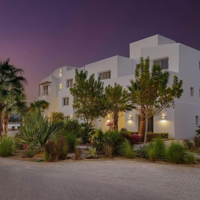 Modern chalet at el gouna Swan Lake compound with Swimable lagoon view