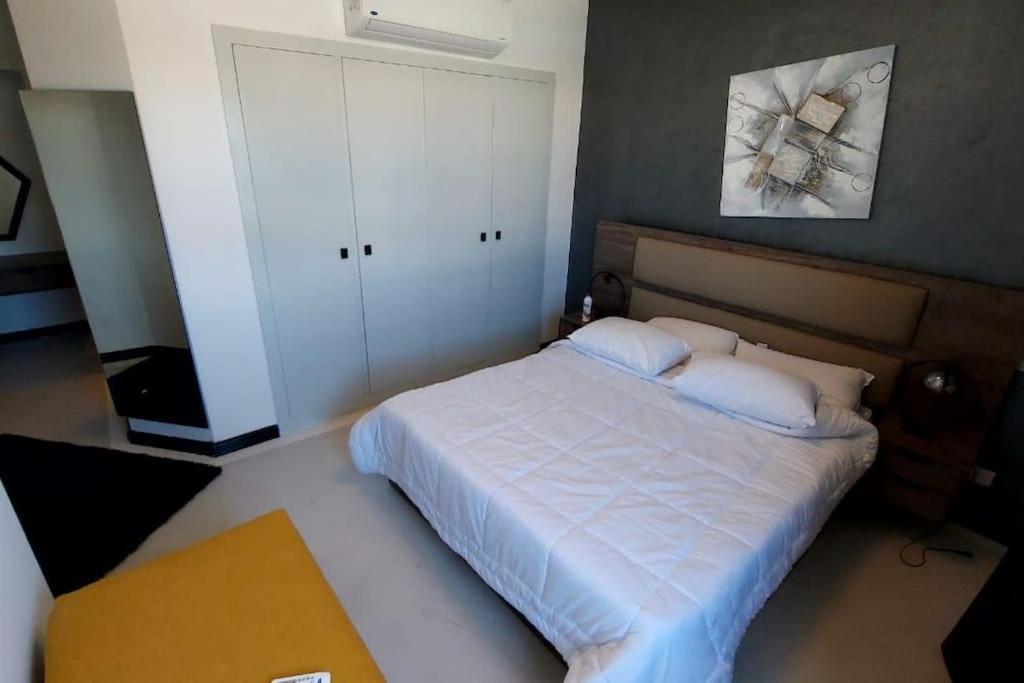 Modern chalet at el gouna Swan Lake compound with Swimable lagoon view