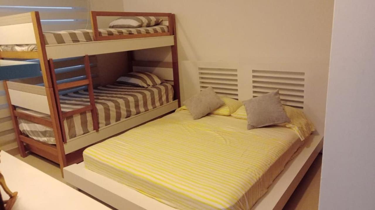 Amplios Aptos de Lujo Frente a la Playa a 5 Minutos del Centro y del Aeropuerto, en Edificio con Piscina, Jacuzzi, Sauna, Gimnasio, Turco y Seguridad las 2