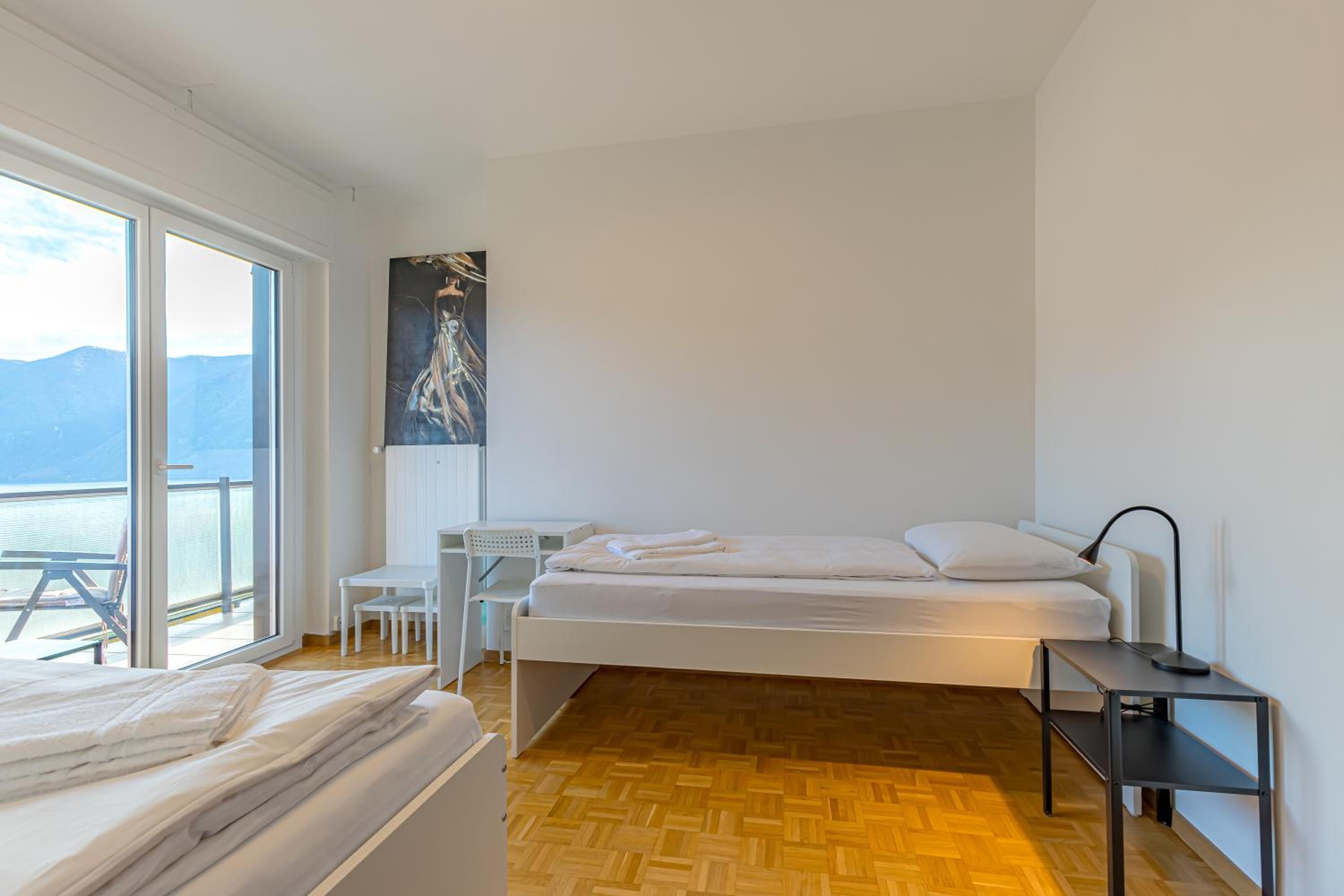 Imperial of Lugano 4 with a lake view behind the station and 10 min from the lake