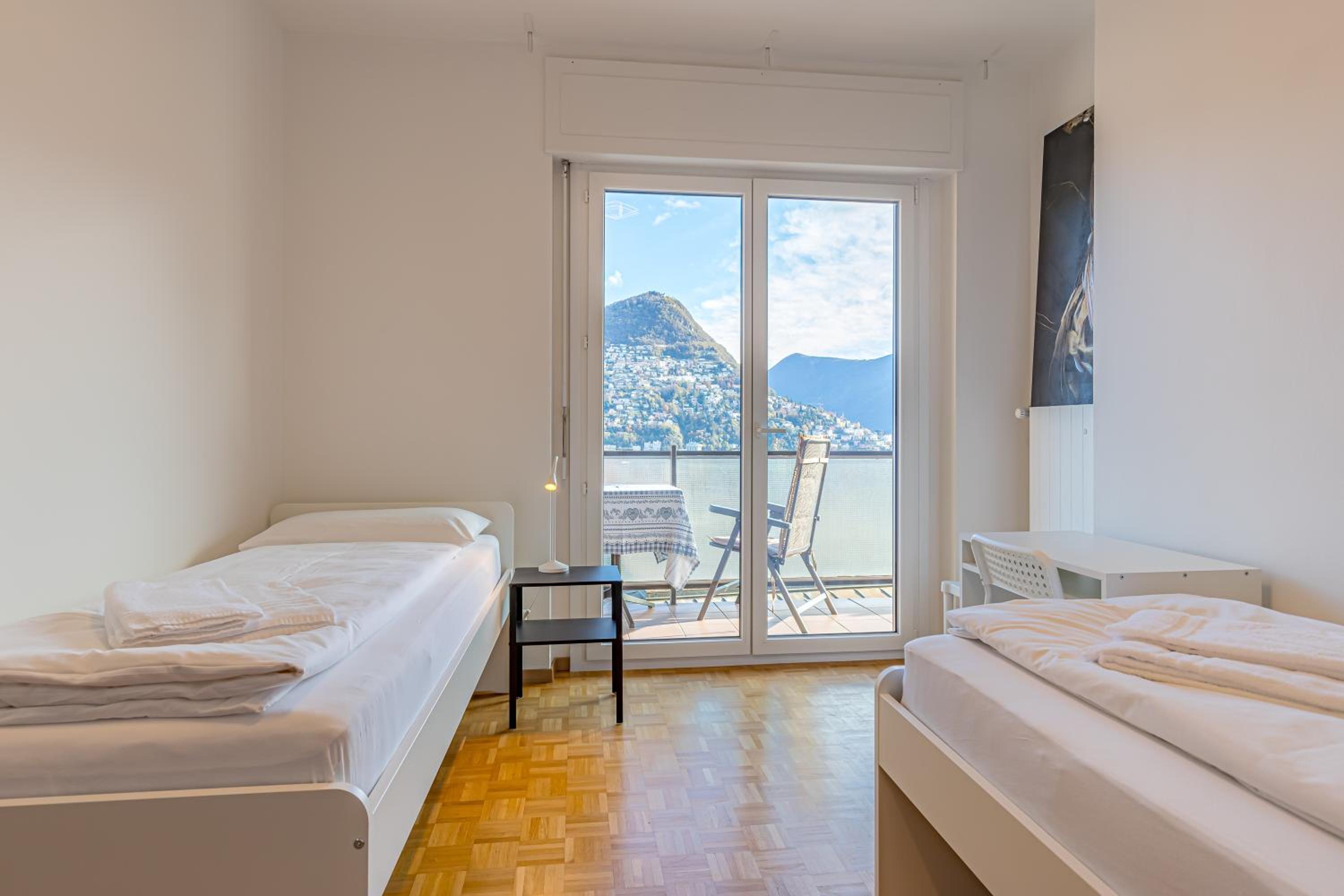 Imperial of Lugano 4 with a lake view behind the station and 10 min from the lake