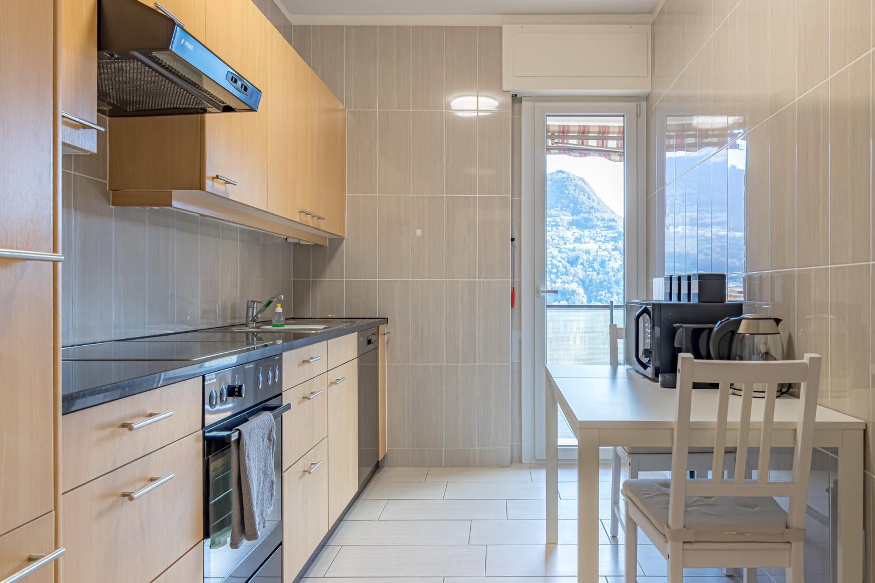 Imperial of Lugano 4 with a lake view behind the station and 10 min from the lake