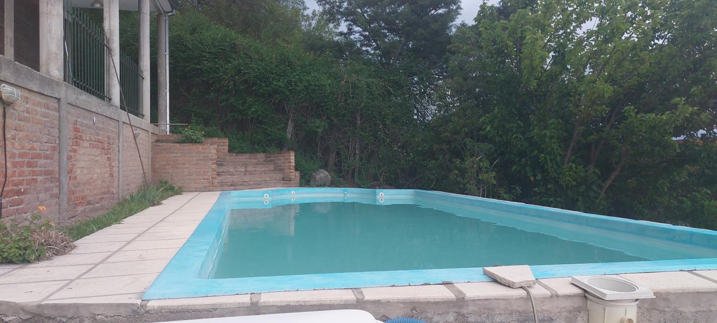 Chalet de Montaña a 8 cuadras del centro de Carlos Paz con pileta de 9 x 4