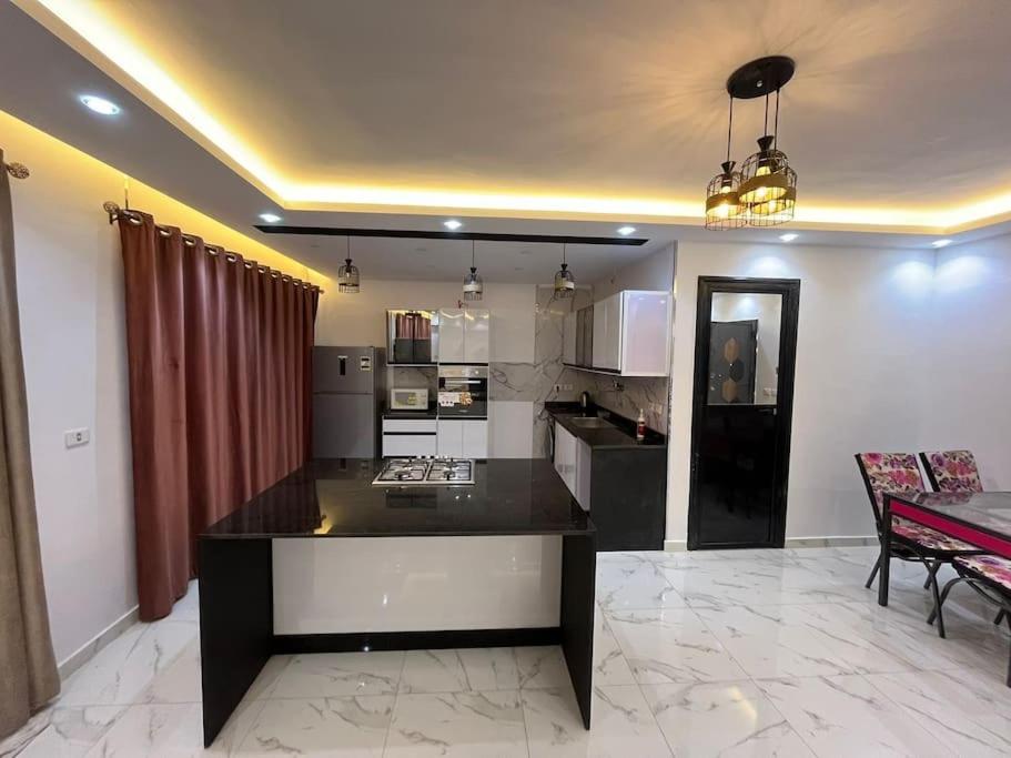 Spacious apartment with beautiful garden near AUC & point 90 mall in fifth settlement