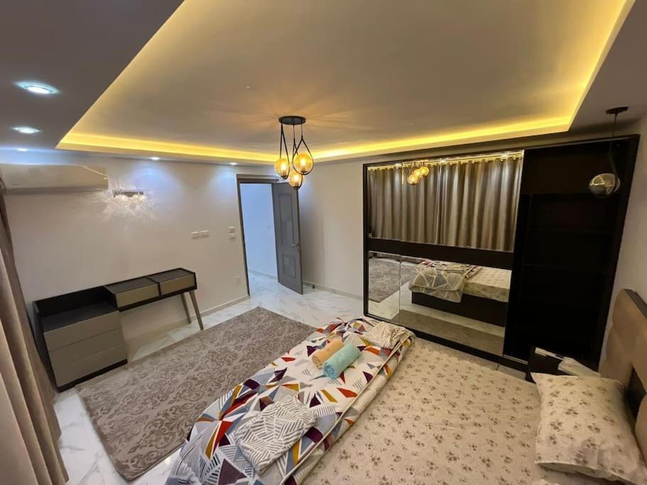 Spacious apartment with beautiful garden near AUC & point 90 mall in fifth settlement
