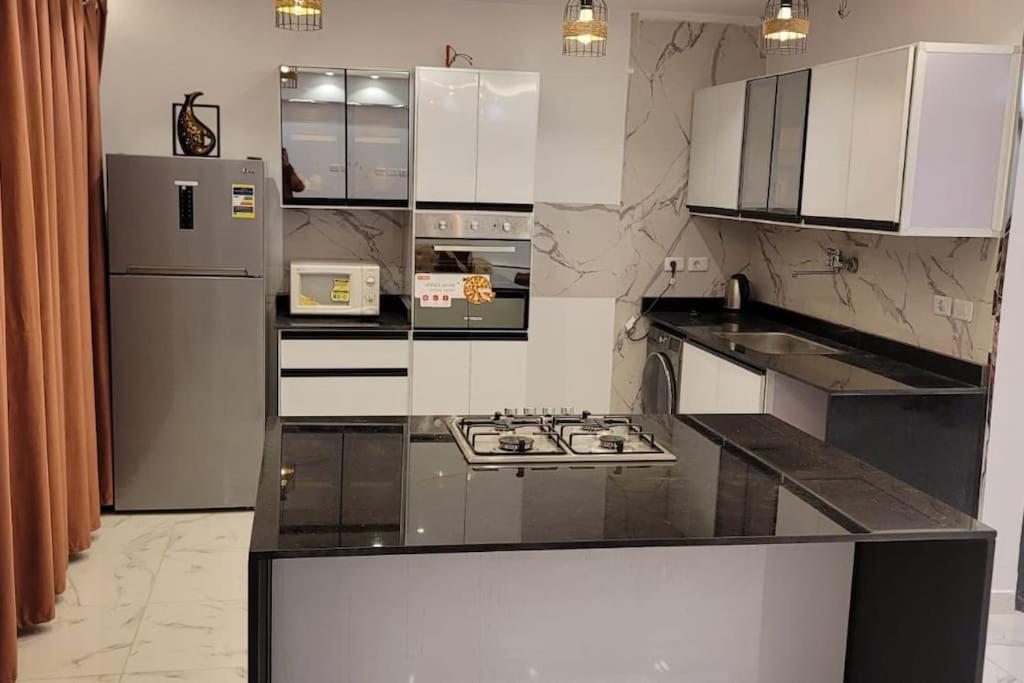 Spacious apartment with beautiful garden near AUC & point 90 mall in fifth settlement