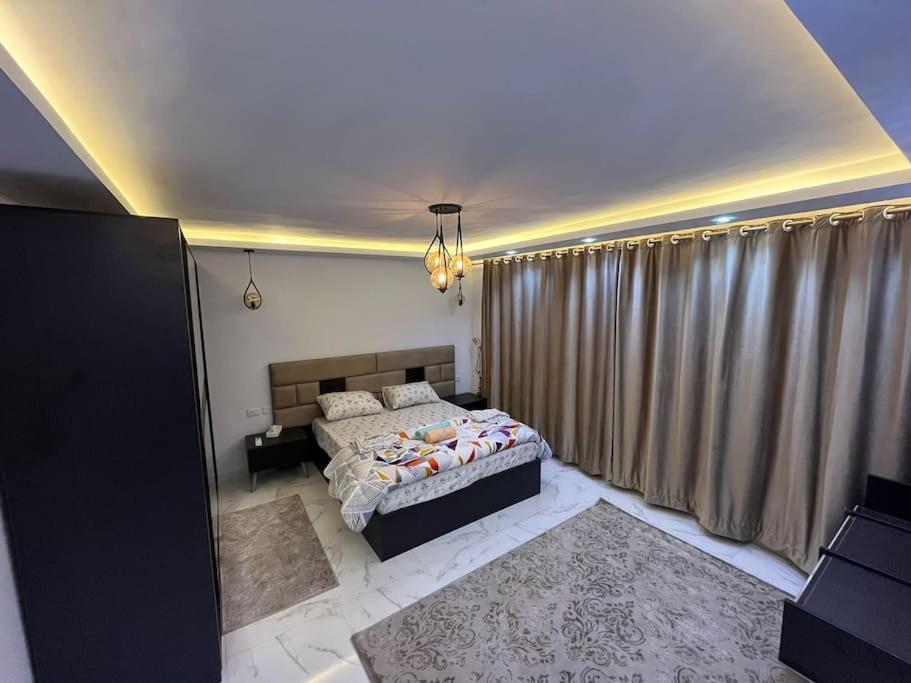 Spacious apartment with beautiful garden near AUC & point 90 mall in fifth settlement