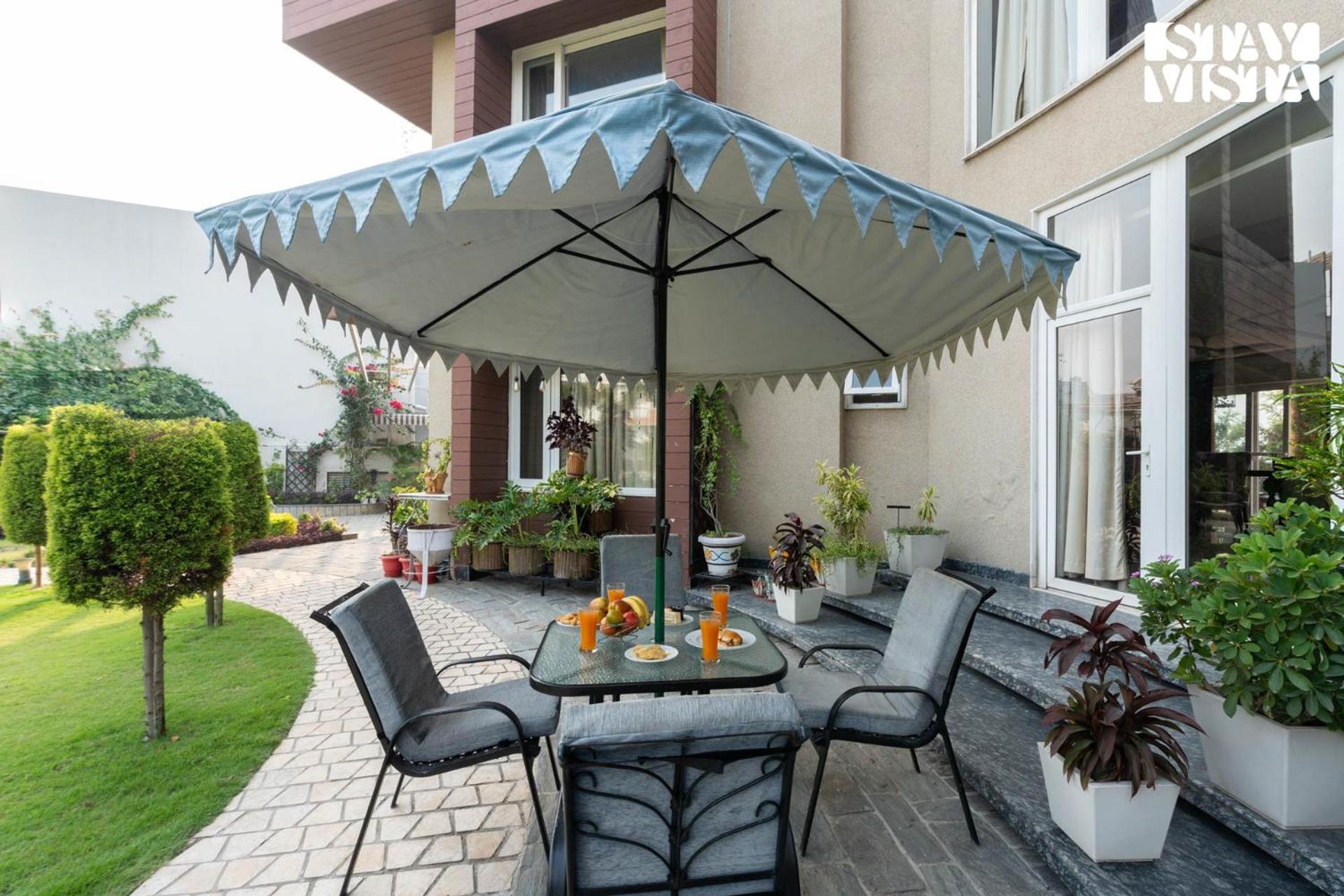 StayVista at Meeraas with Balcony, Heater & Lawn view 2