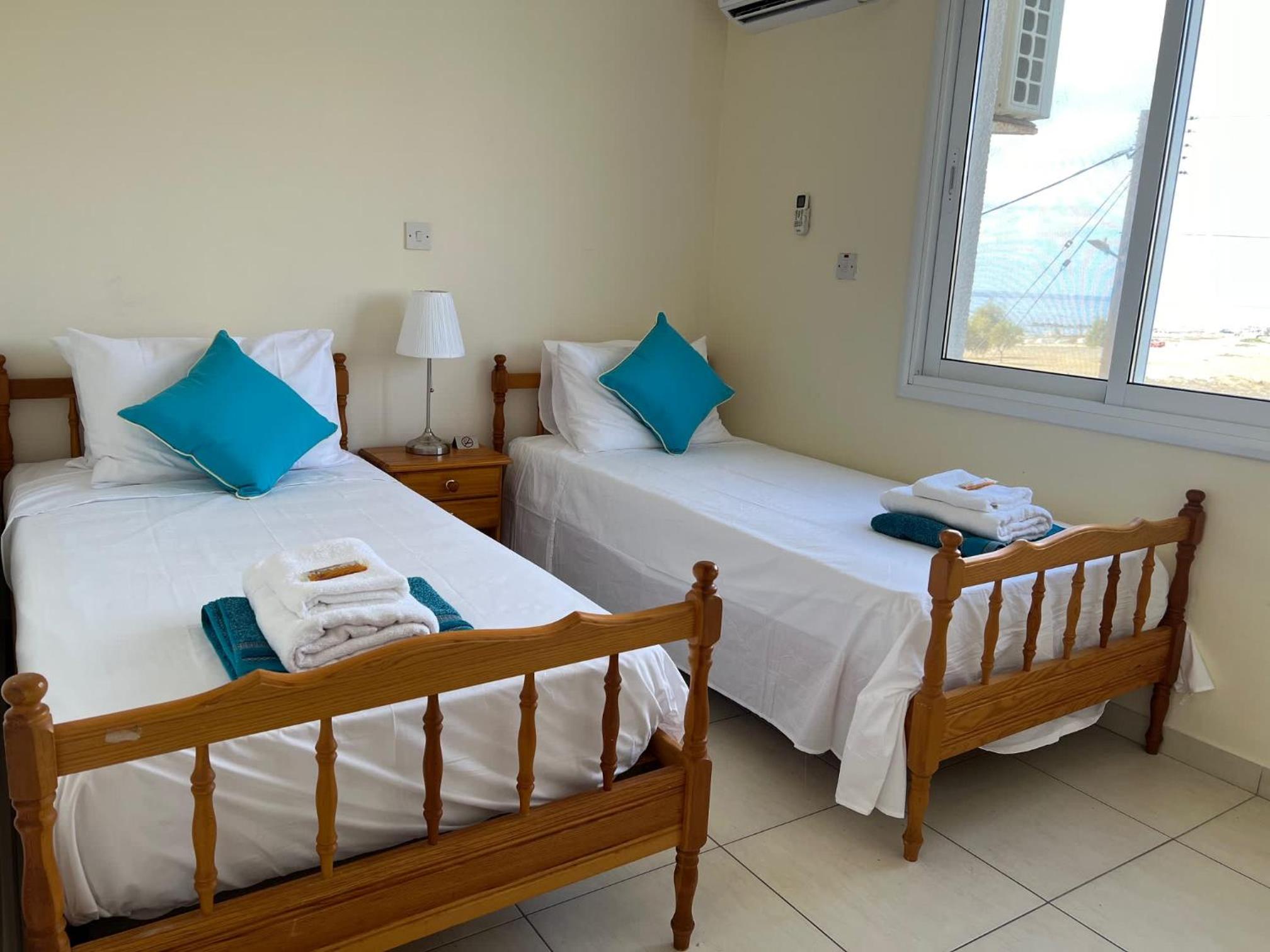 Lighthouse Beach - 3BR Seafront Apt 50m to Beach with Sea Views - Sleeps 6