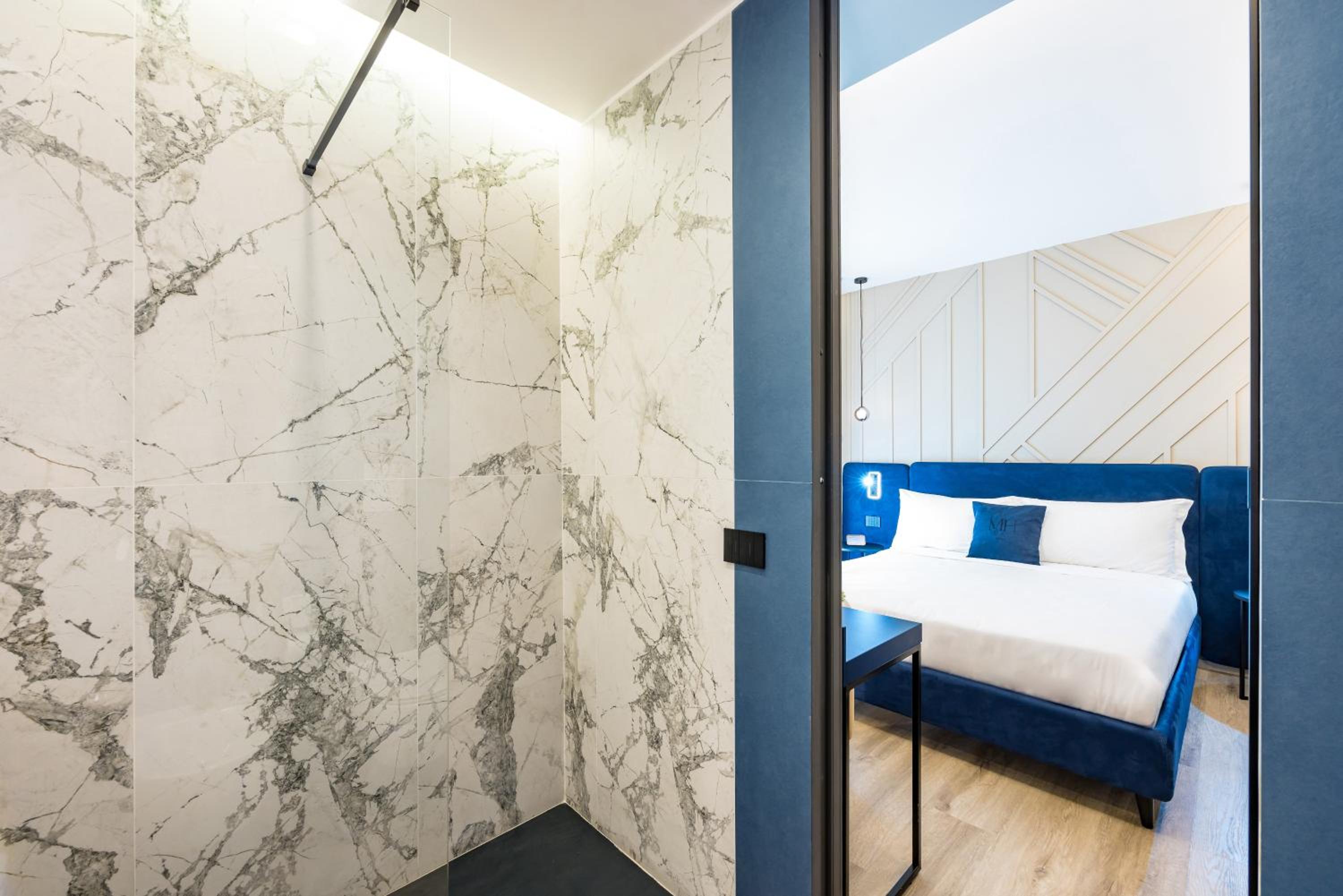 MH SUITES Plebiscito