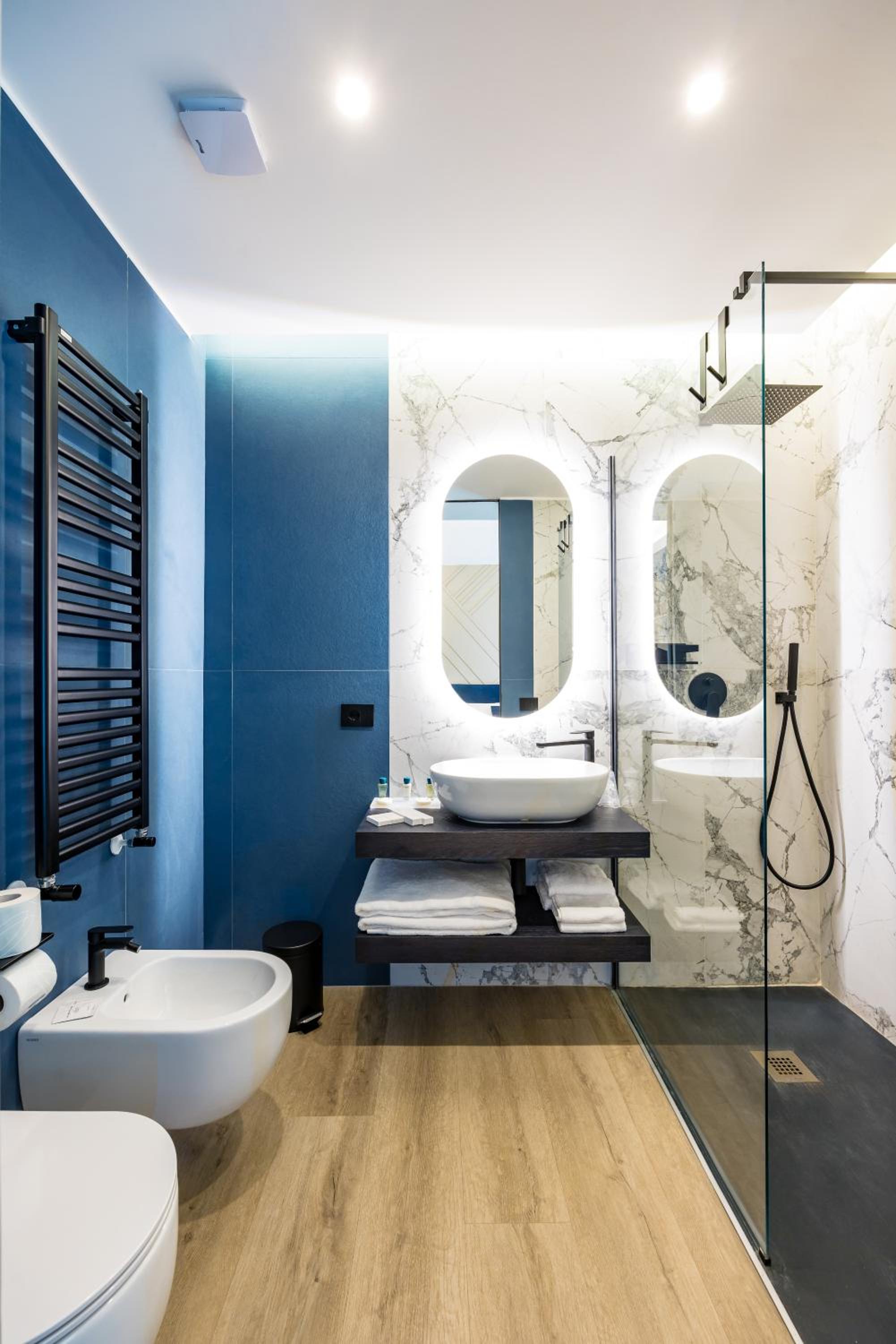 MH SUITES Plebiscito