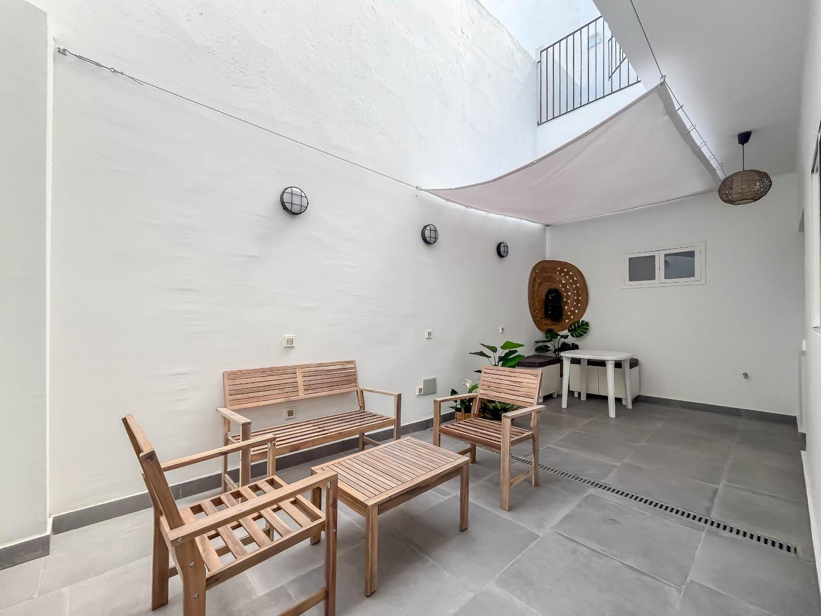 Mol-Terrace, En-Suite Bathroom, Fridge & TV view 5