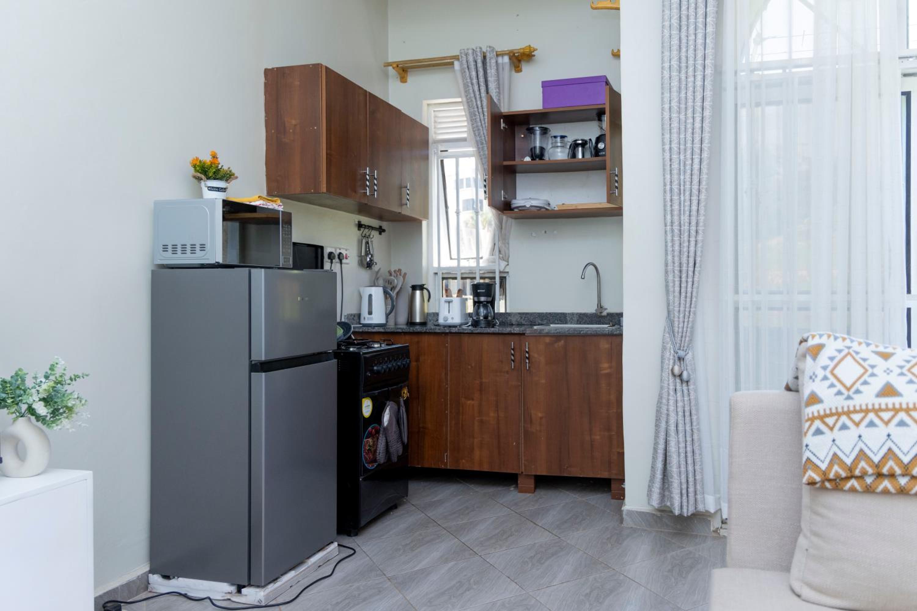 Theo'sCozyHaven Muyenga-Bukasa