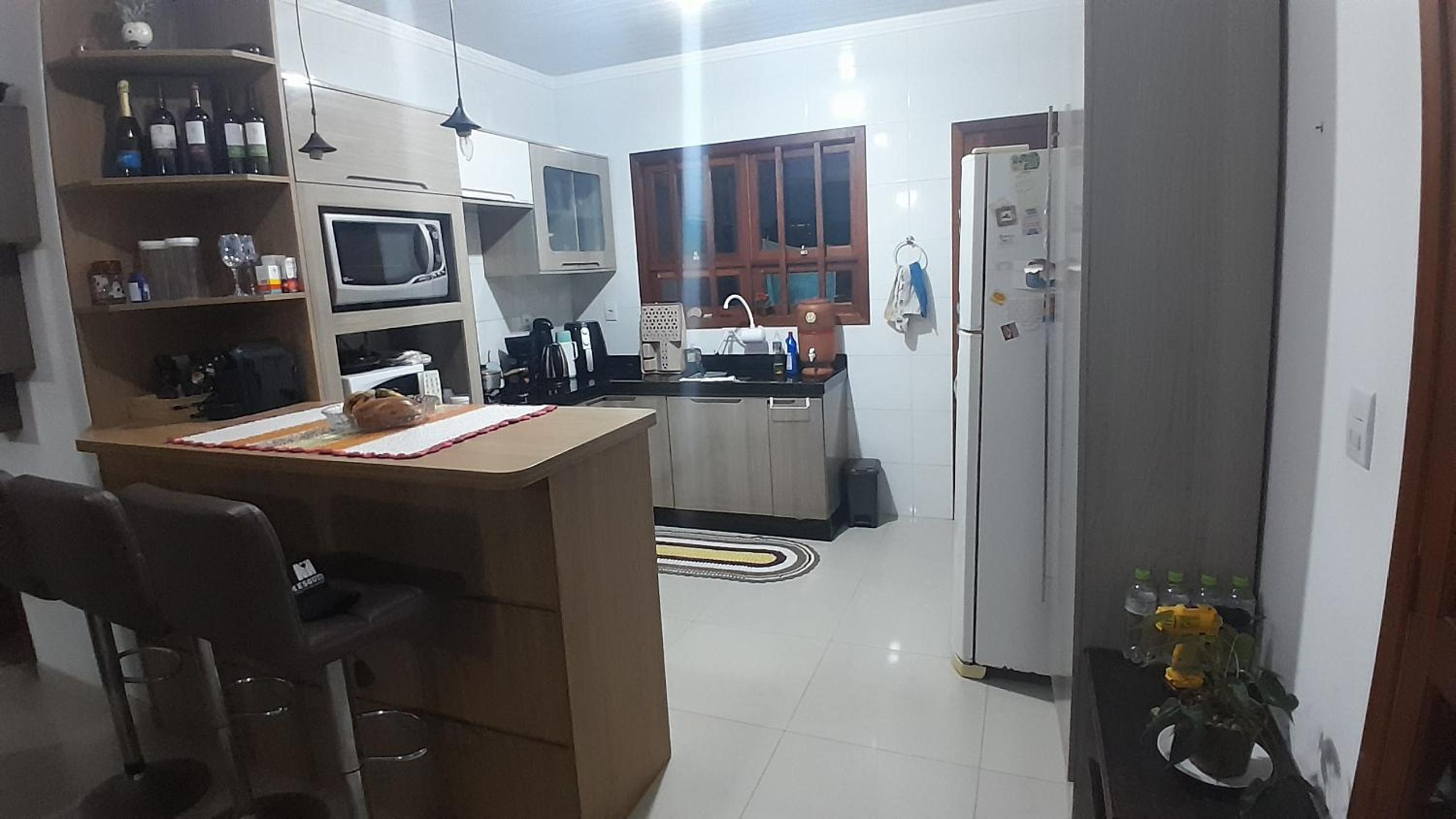 Casa aconchegante próximo a praia, 2 dormitórios