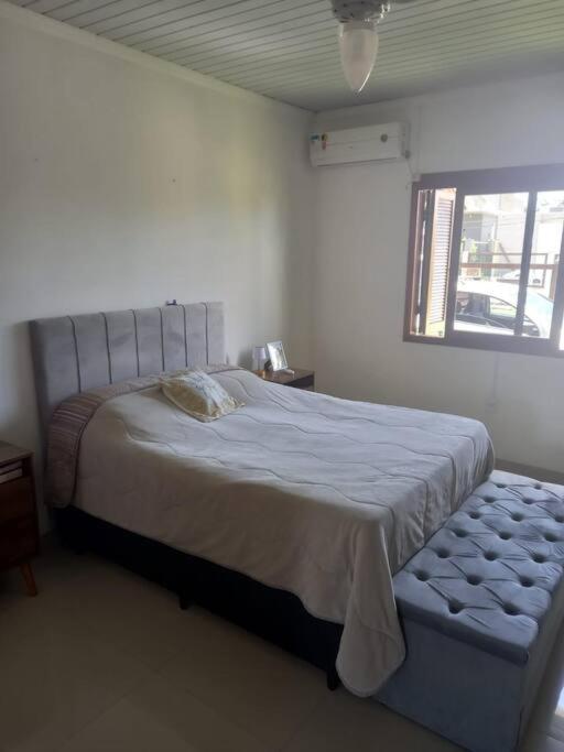 Casa aconchegante próximo a praia, 2 dormitórios
