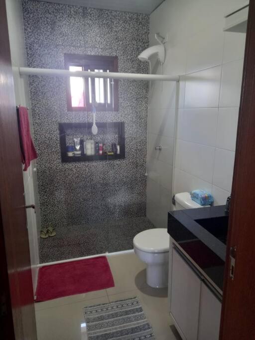 Casa aconchegante próximo a praia, 2 dormitórios