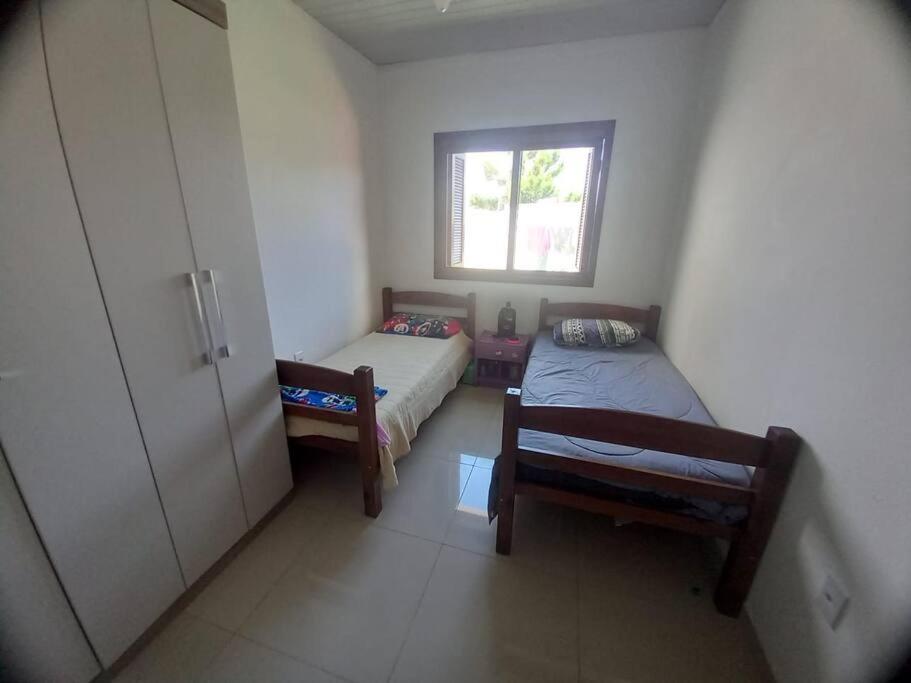 Casa aconchegante próximo a praia, 2 dormitórios