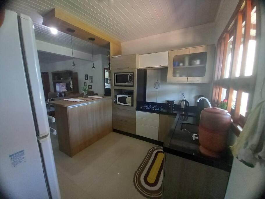 Casa aconchegante próximo a praia, 2 dormitórios