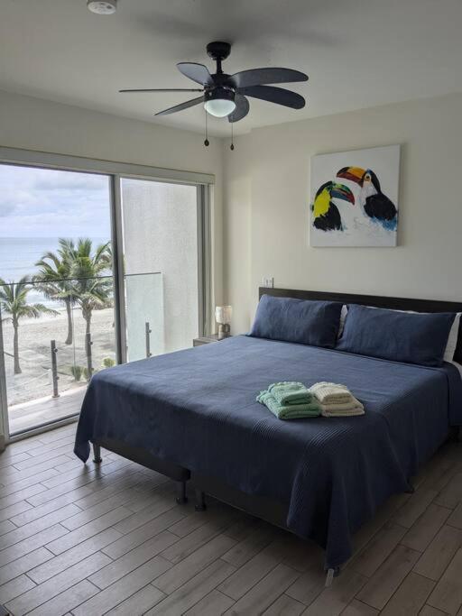 White Sands, Aquamarine waters and High Surfs
