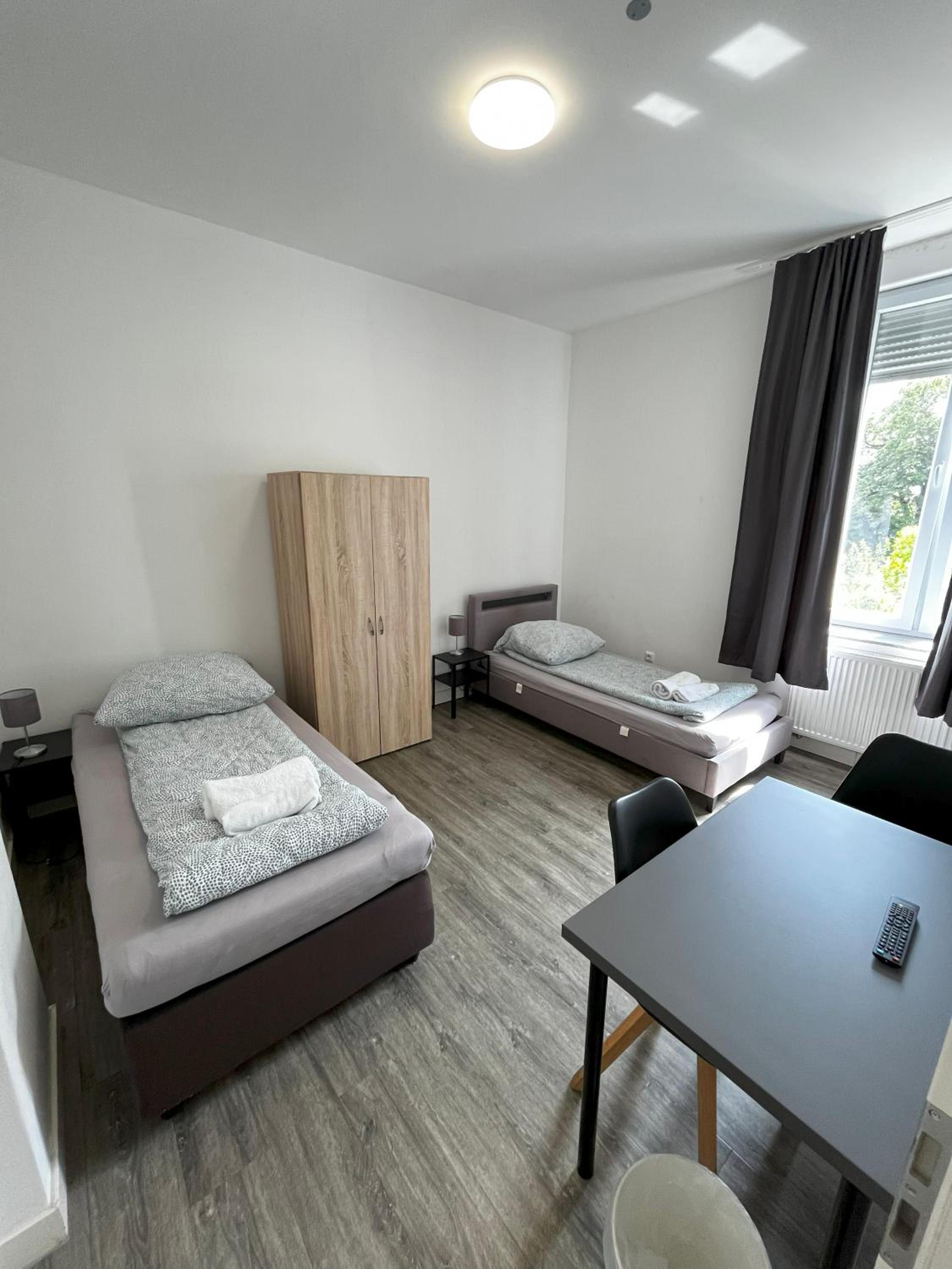 Two-Bedroom Private Suites with Bathroom & Kitchenette