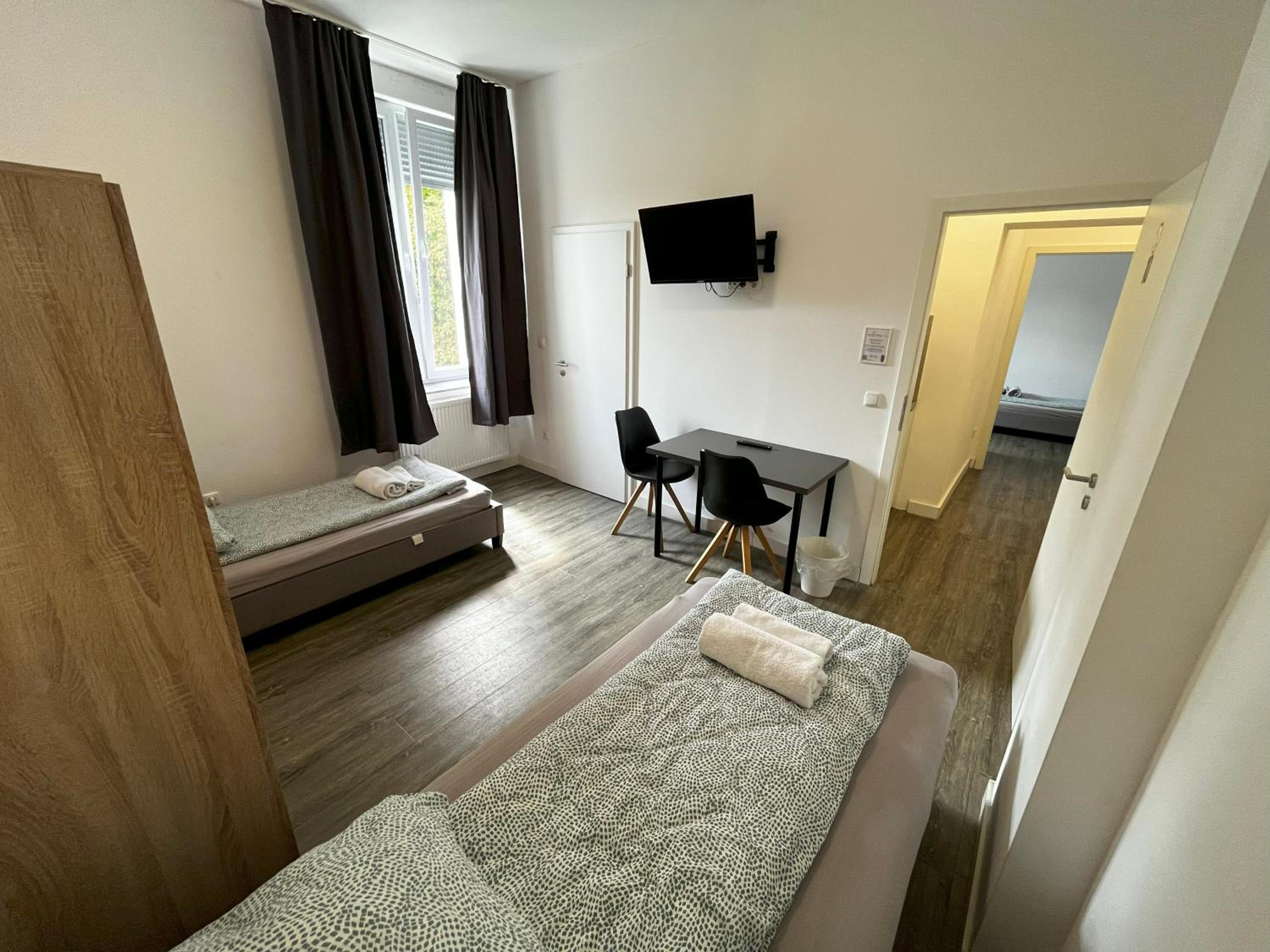 Two-Bedroom Private Suites with Bathroom & Kitchenette