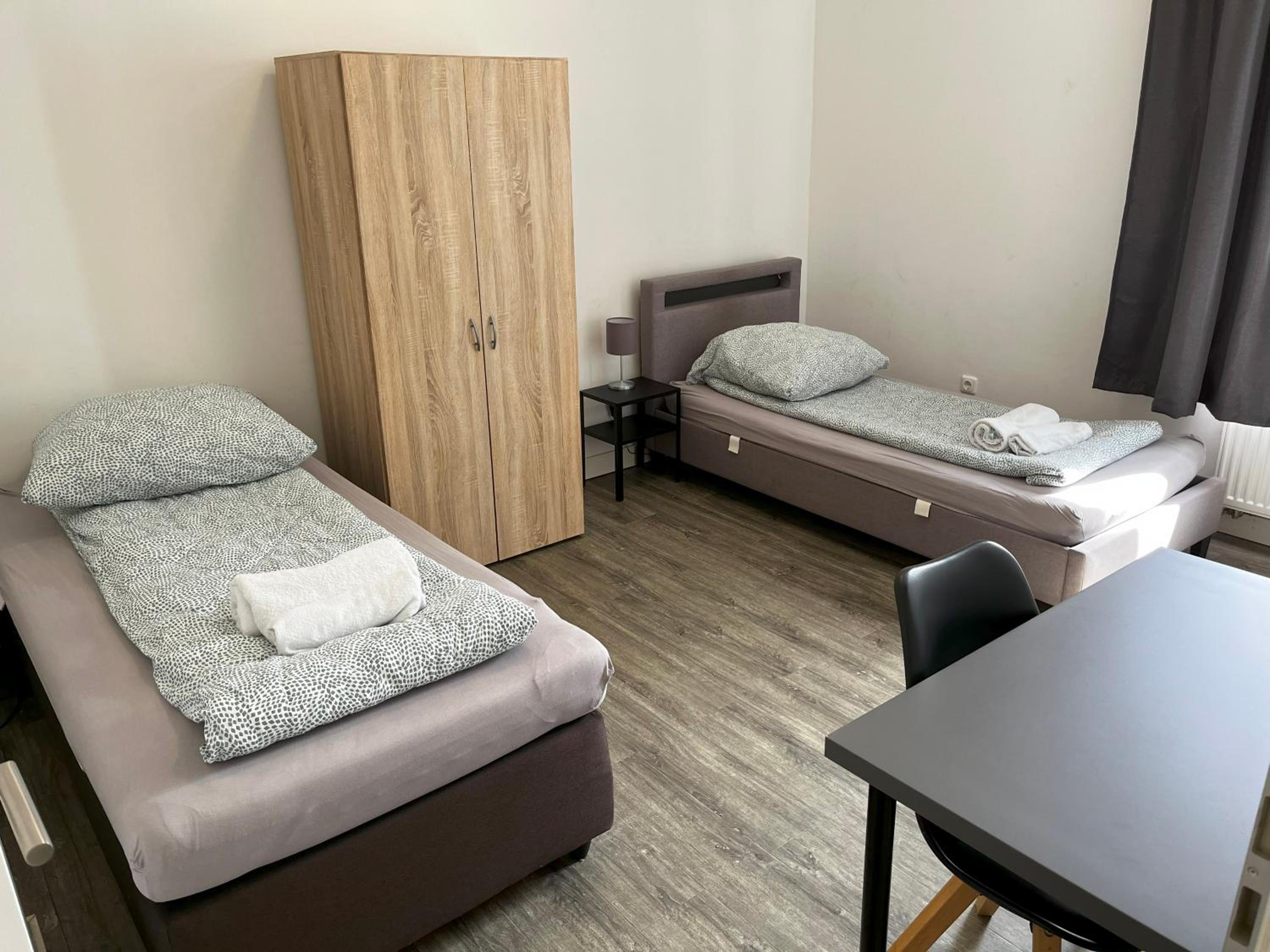 Two-Bedroom Private Suites with Bathroom & Kitchenette